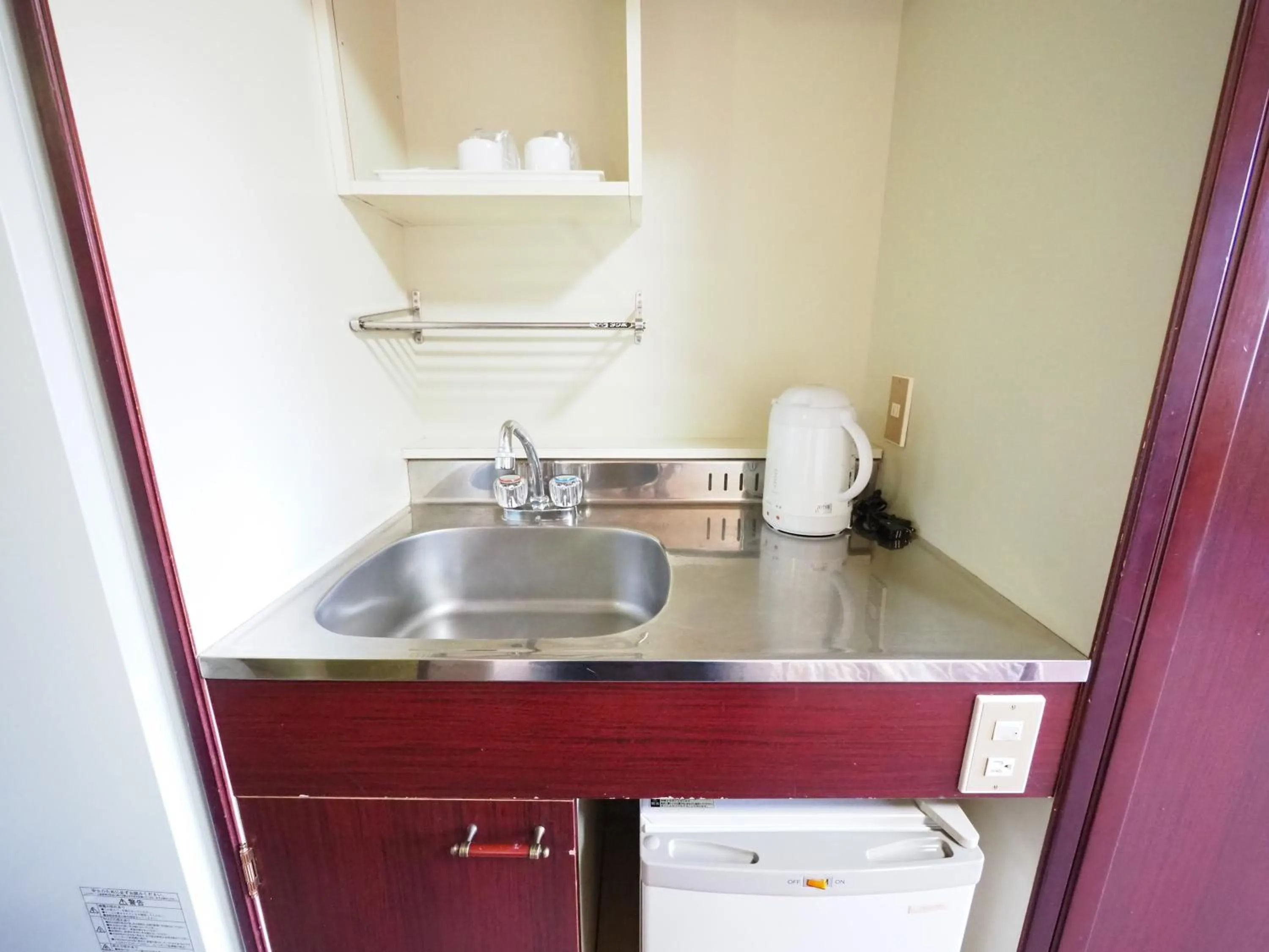 Kitchen or kitchenette in Sky Heart Hotel Shimonoseki