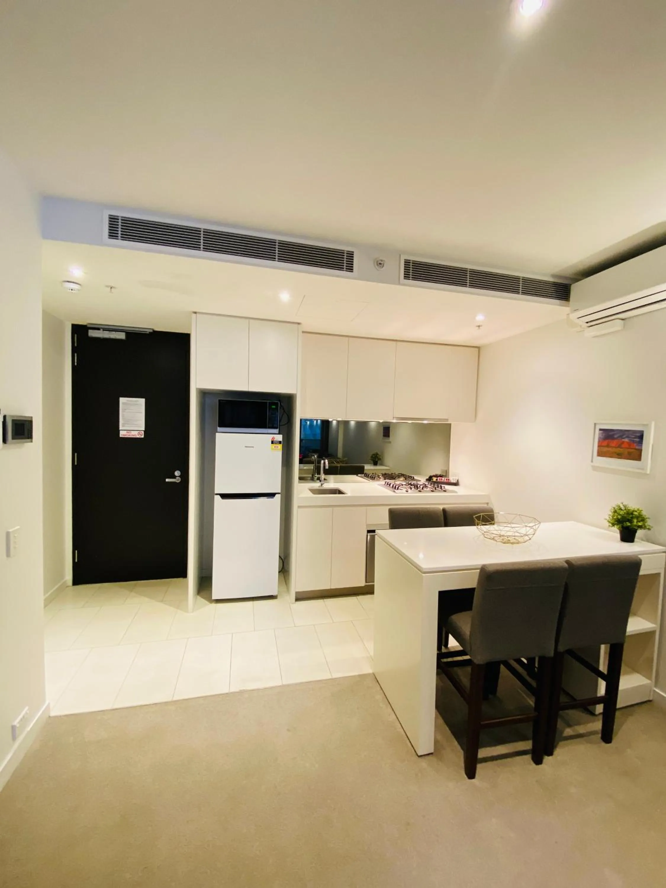 Kitchen or kitchenette in Flinders Street Apartments Melbourne CBD