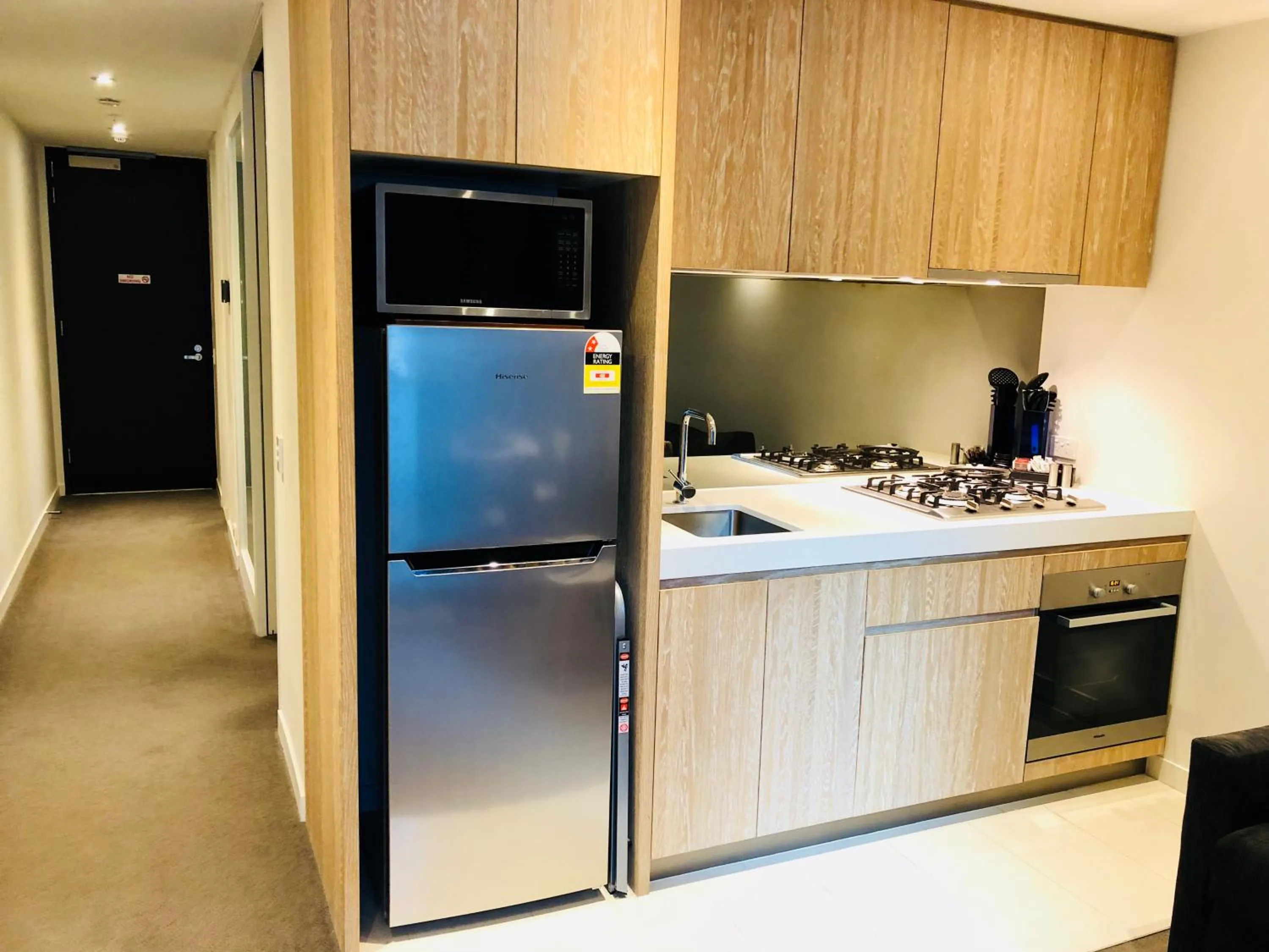 Kitchen or kitchenette in Flinders Street Apartments Melbourne CBD