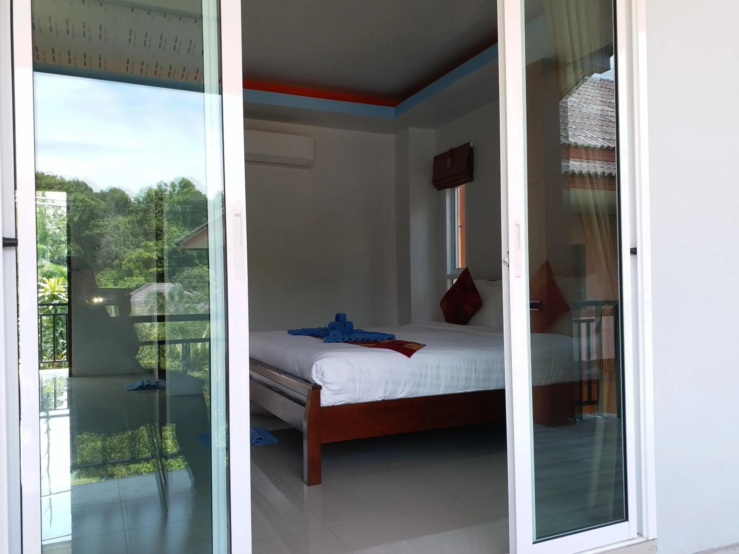 Bed in Tamarind Lanta Resort