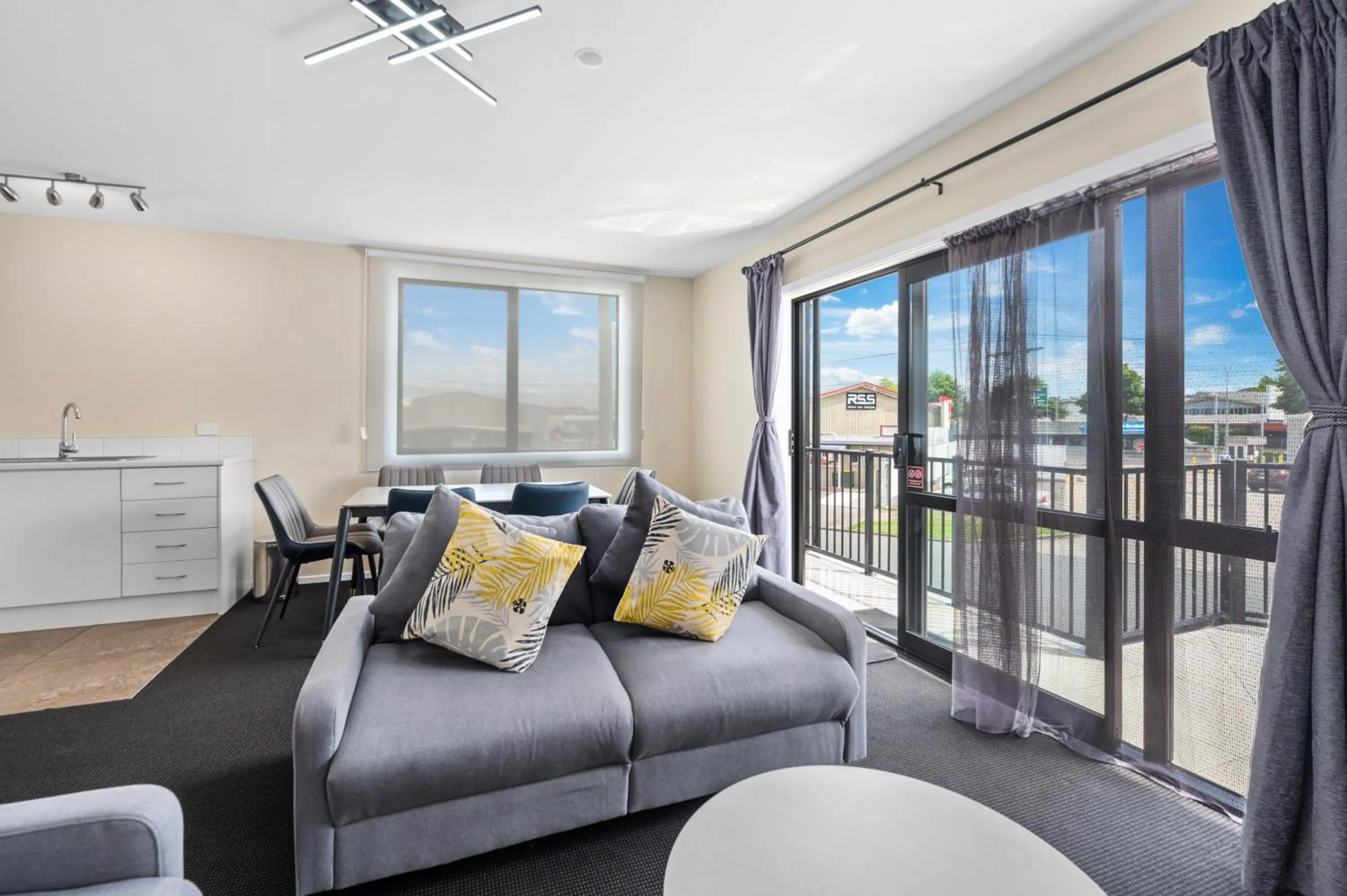 Living room in ASURE Rotorua International Motor Inn