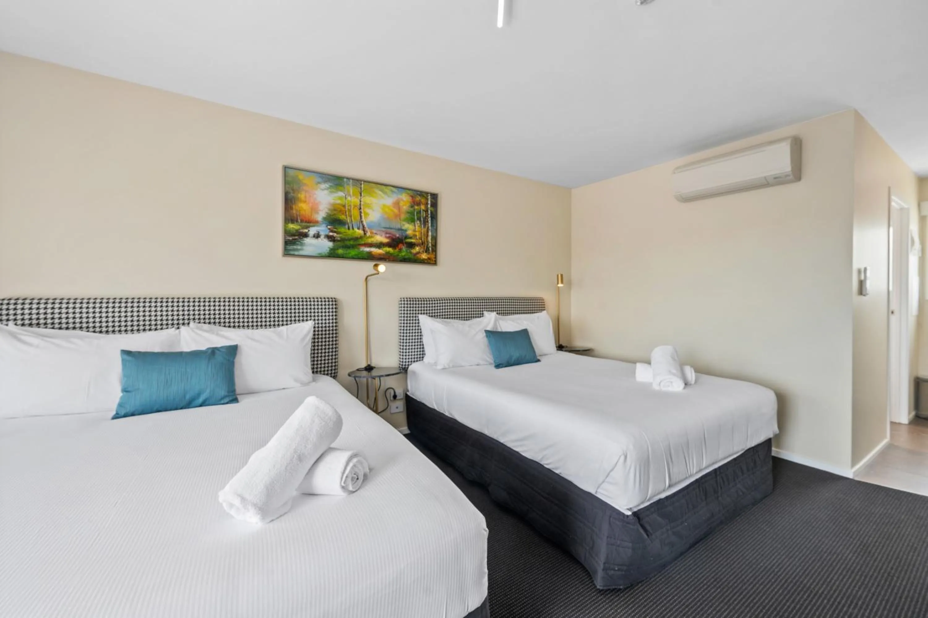 Bed in ASURE Rotorua International Motor Inn