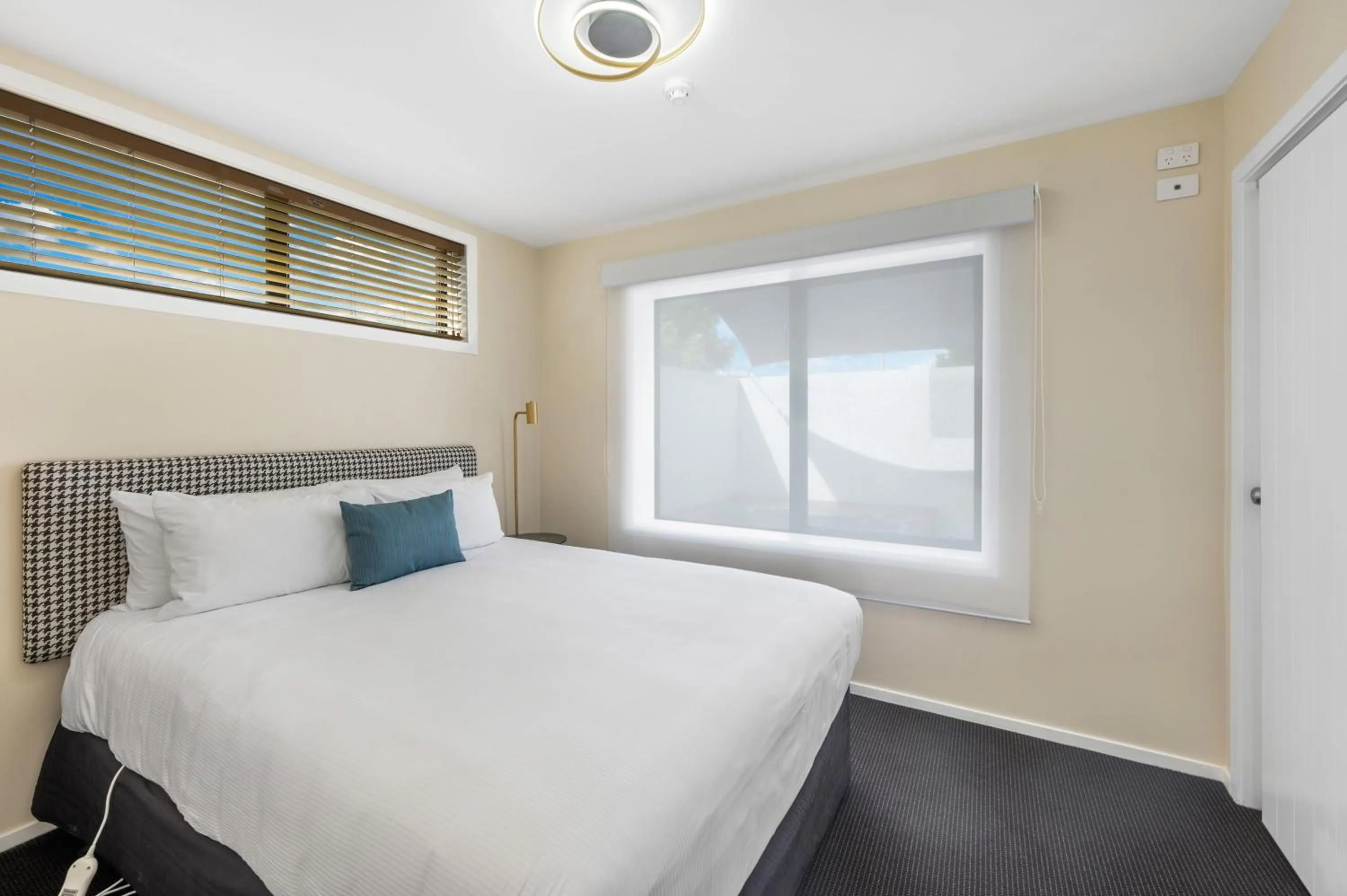 Bed in ASURE Rotorua International Motor Inn