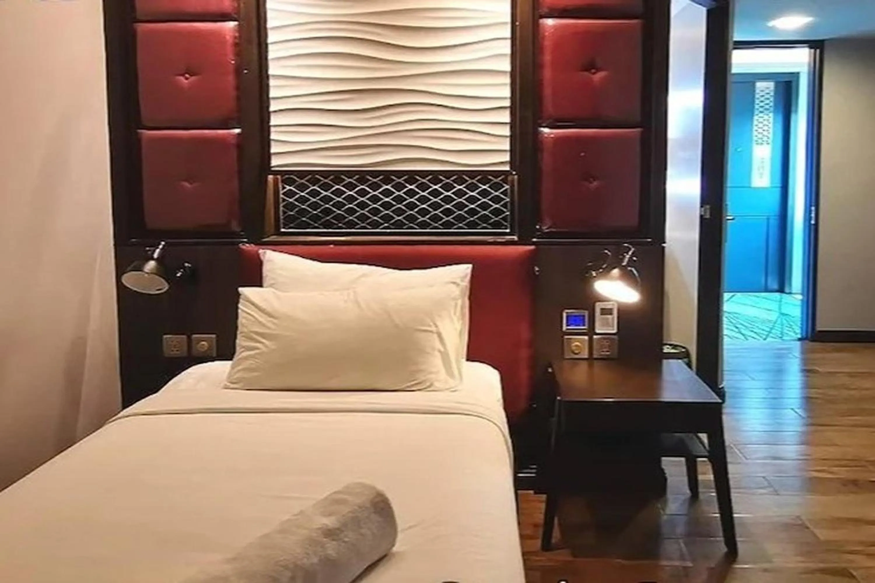 Bed in Holatel Hotel Phitsanulok