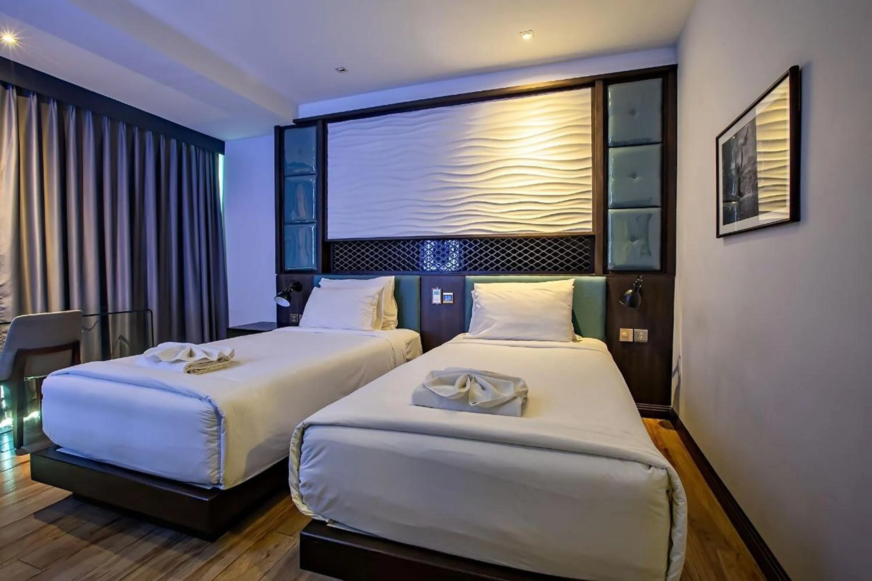 Bed in Holatel Hotel Phitsanulok