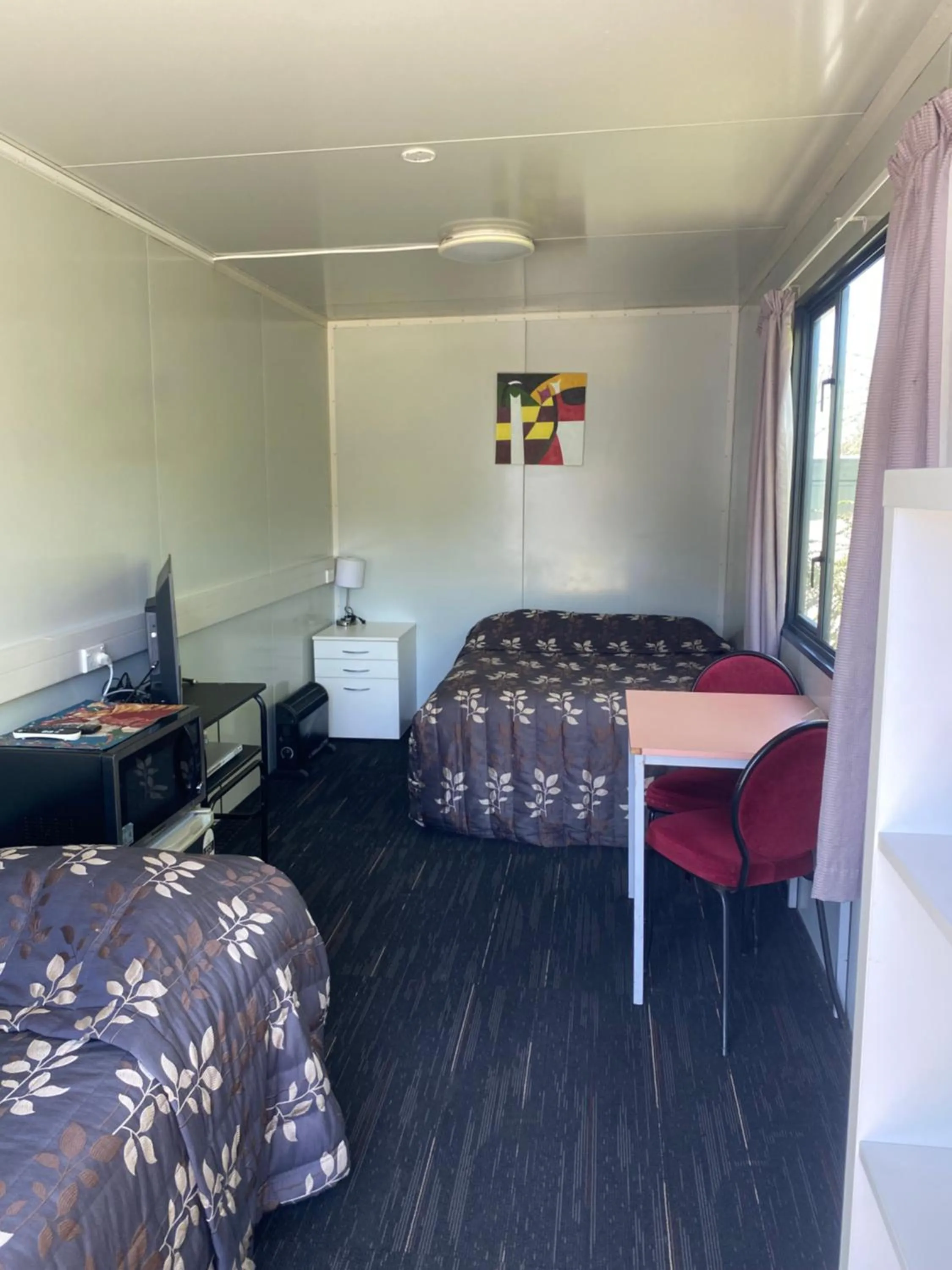 Bed in Rangiora Eco Holiday Park