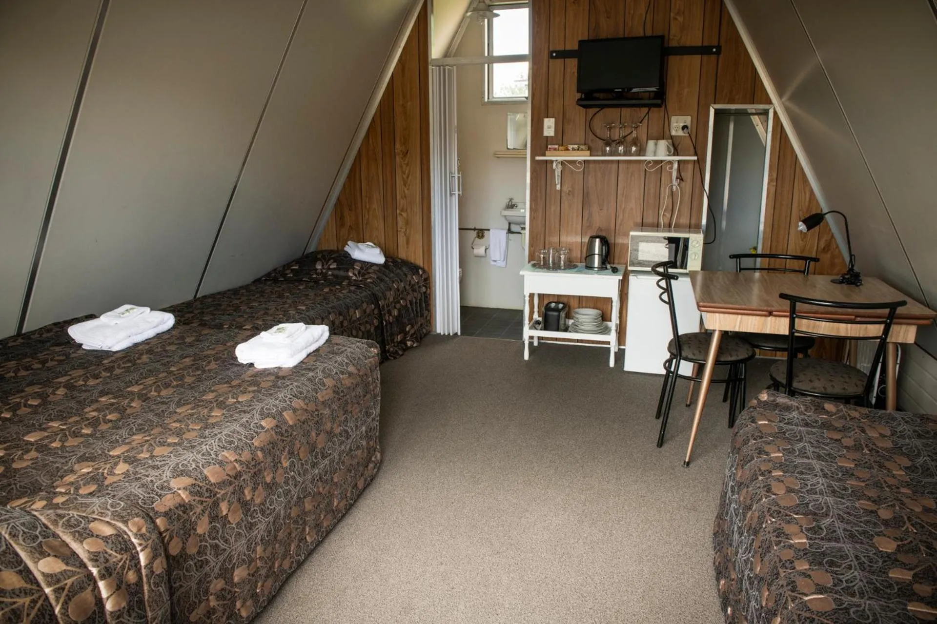 Bed in Rangiora Eco Holiday Park