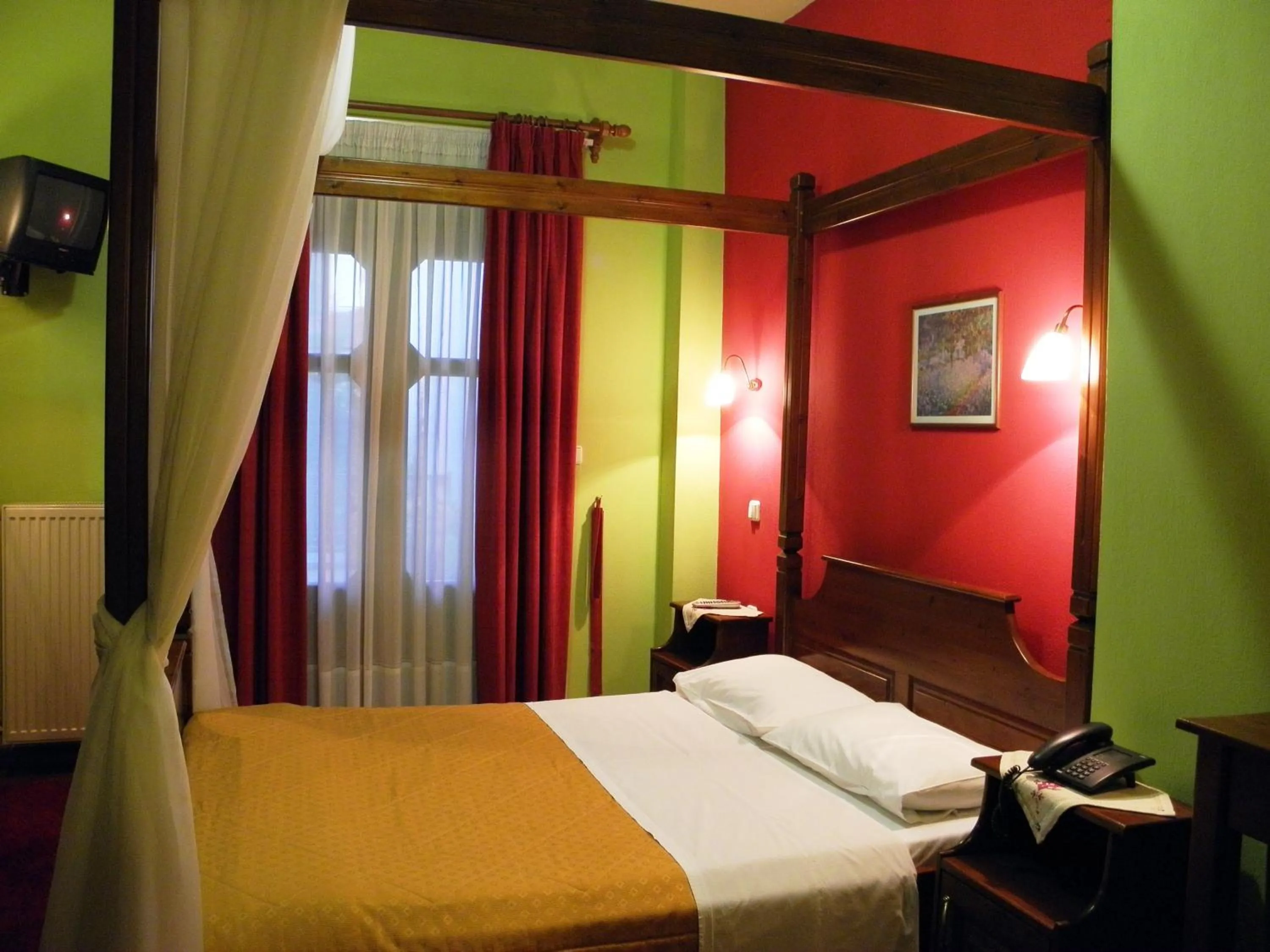 Bed in Hotel Mpakou