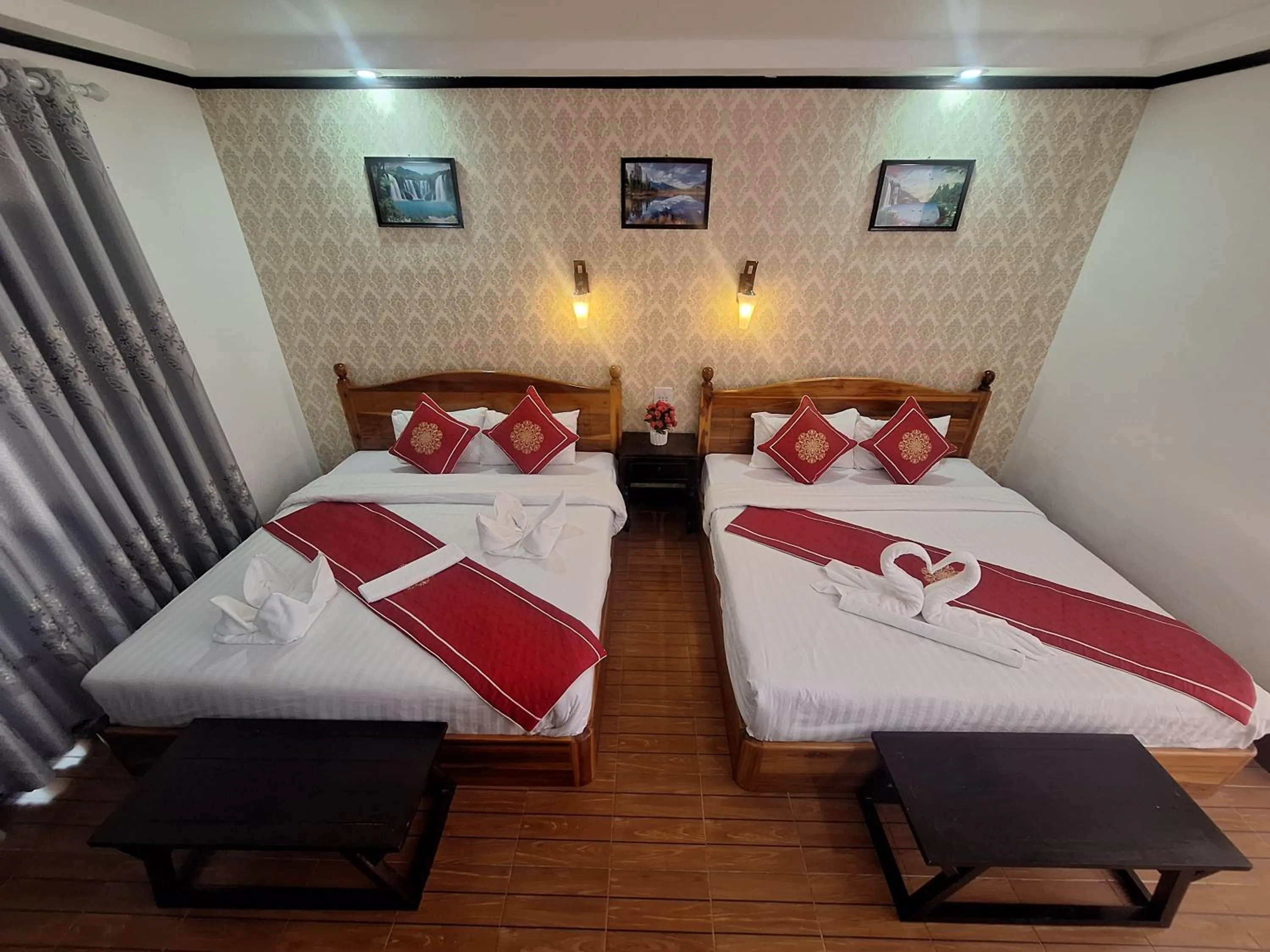 Bed in Luang Prabang Pavilion Hotel & Travel