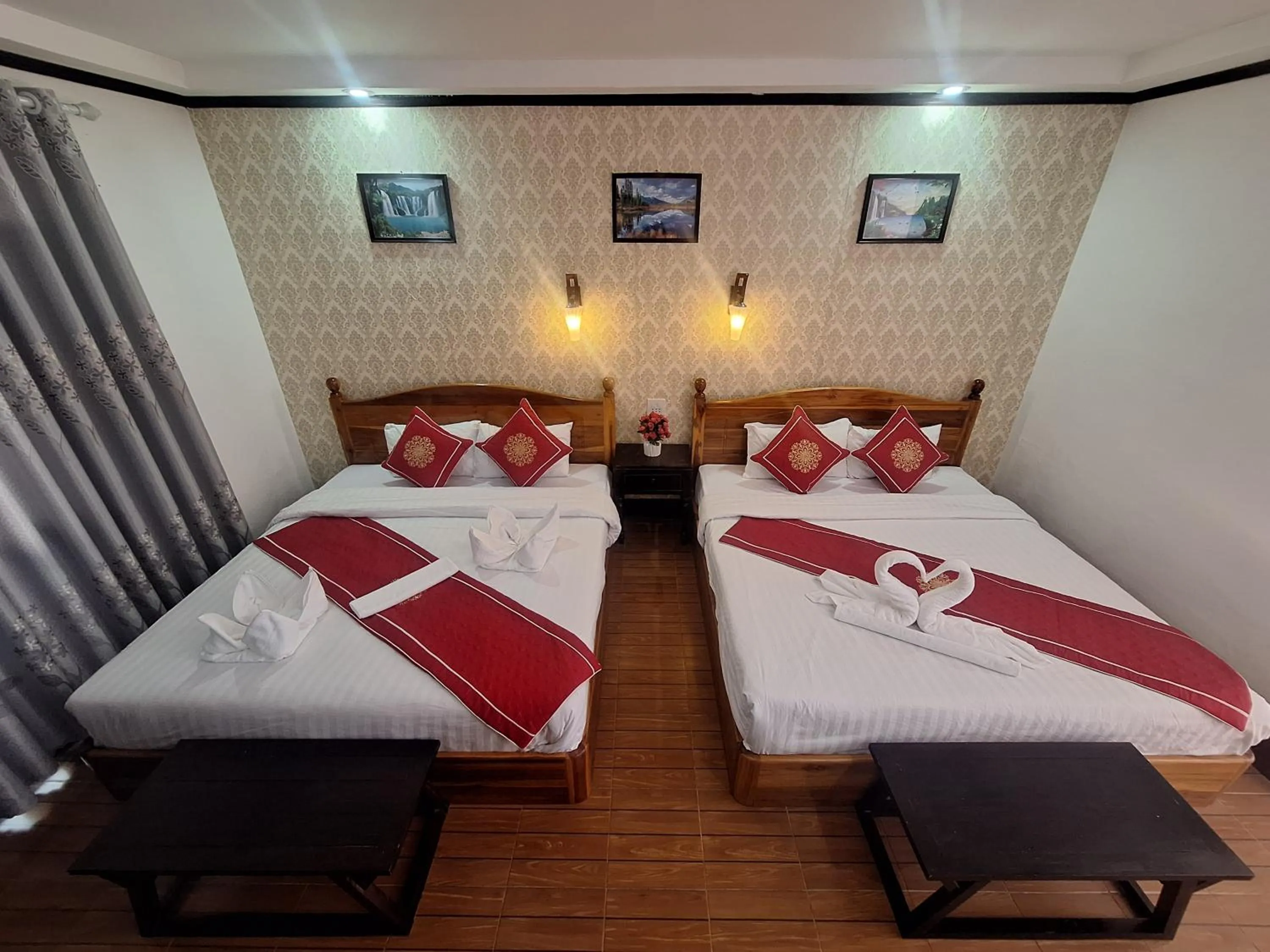 Bed in Luang Prabang Pavilion Hotel & Travel