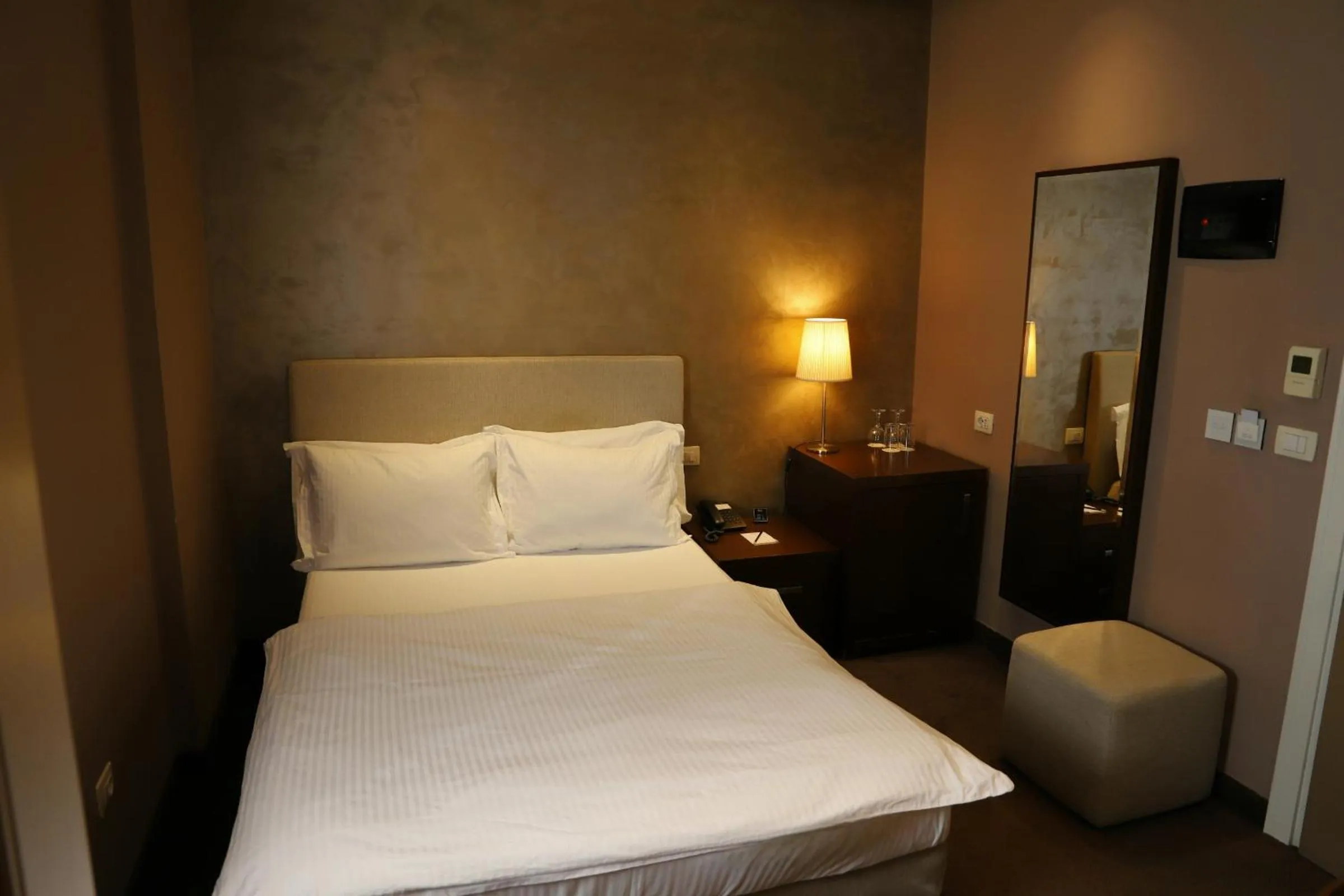 Bed in Mondial Hotel