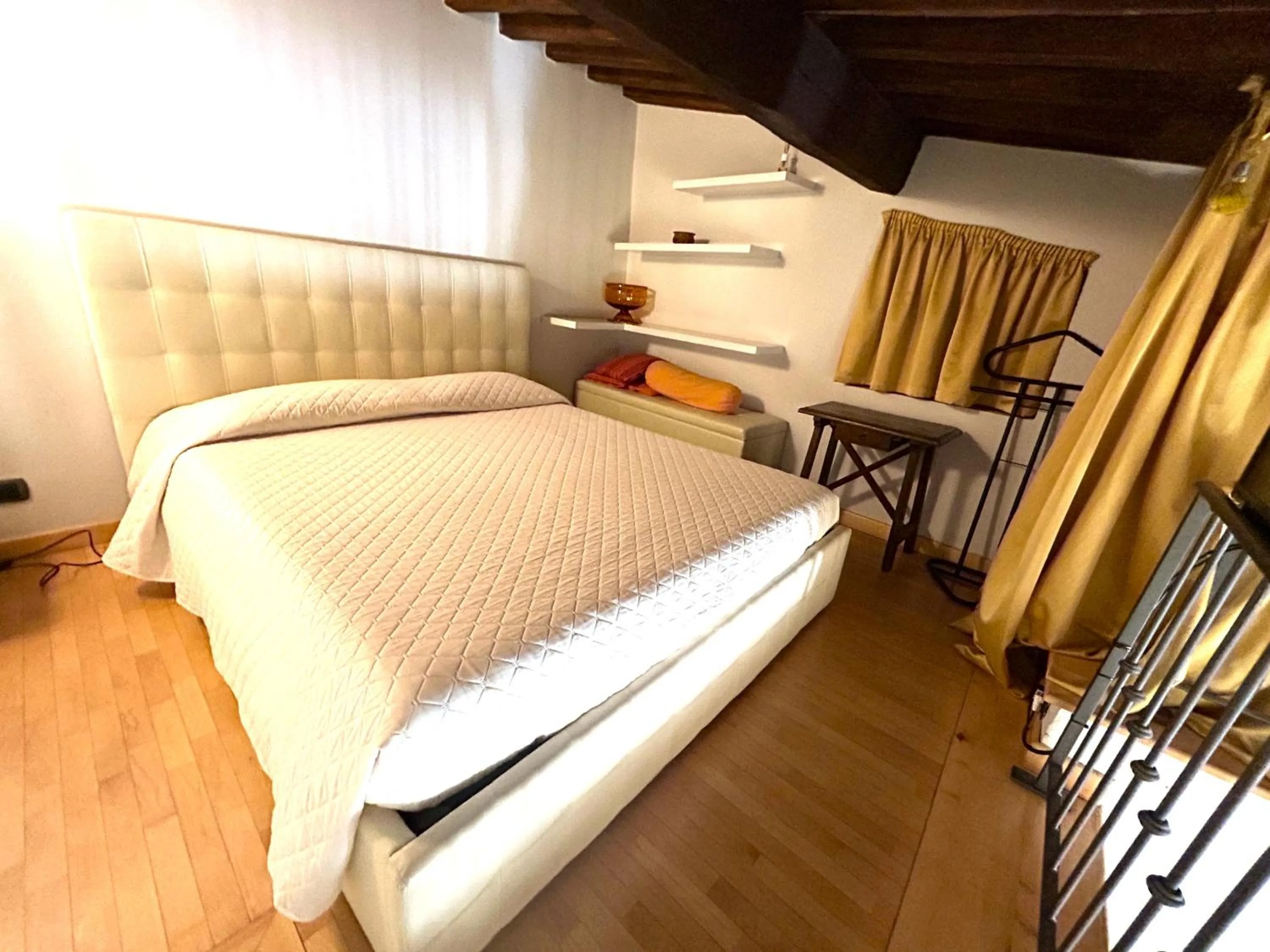 Bed in La Corte Del Re Suite & Rooms Arezzo