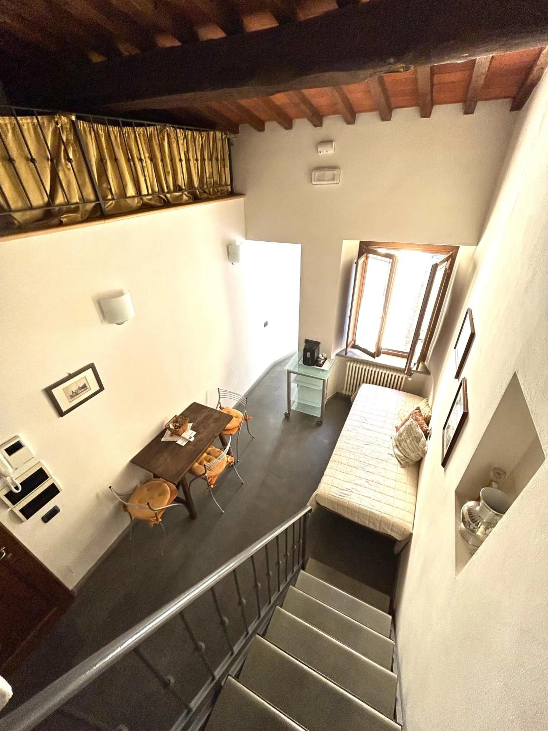 Bed in La Corte Del Re Suite & Rooms Arezzo