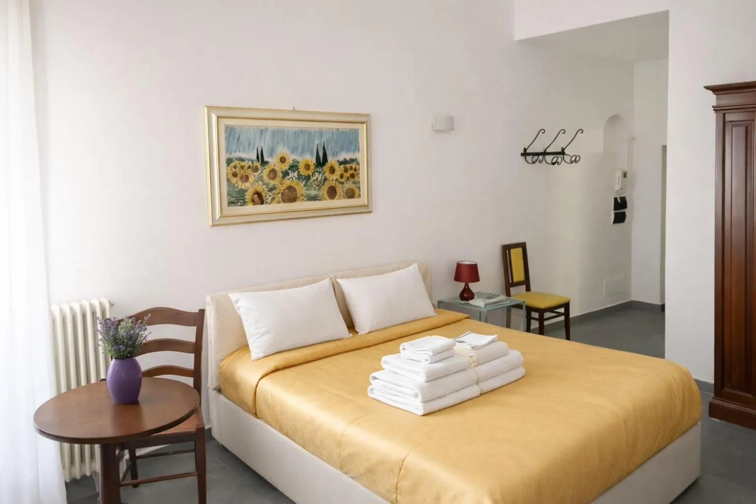 Bed in La Corte Del Re Suite & Rooms Arezzo