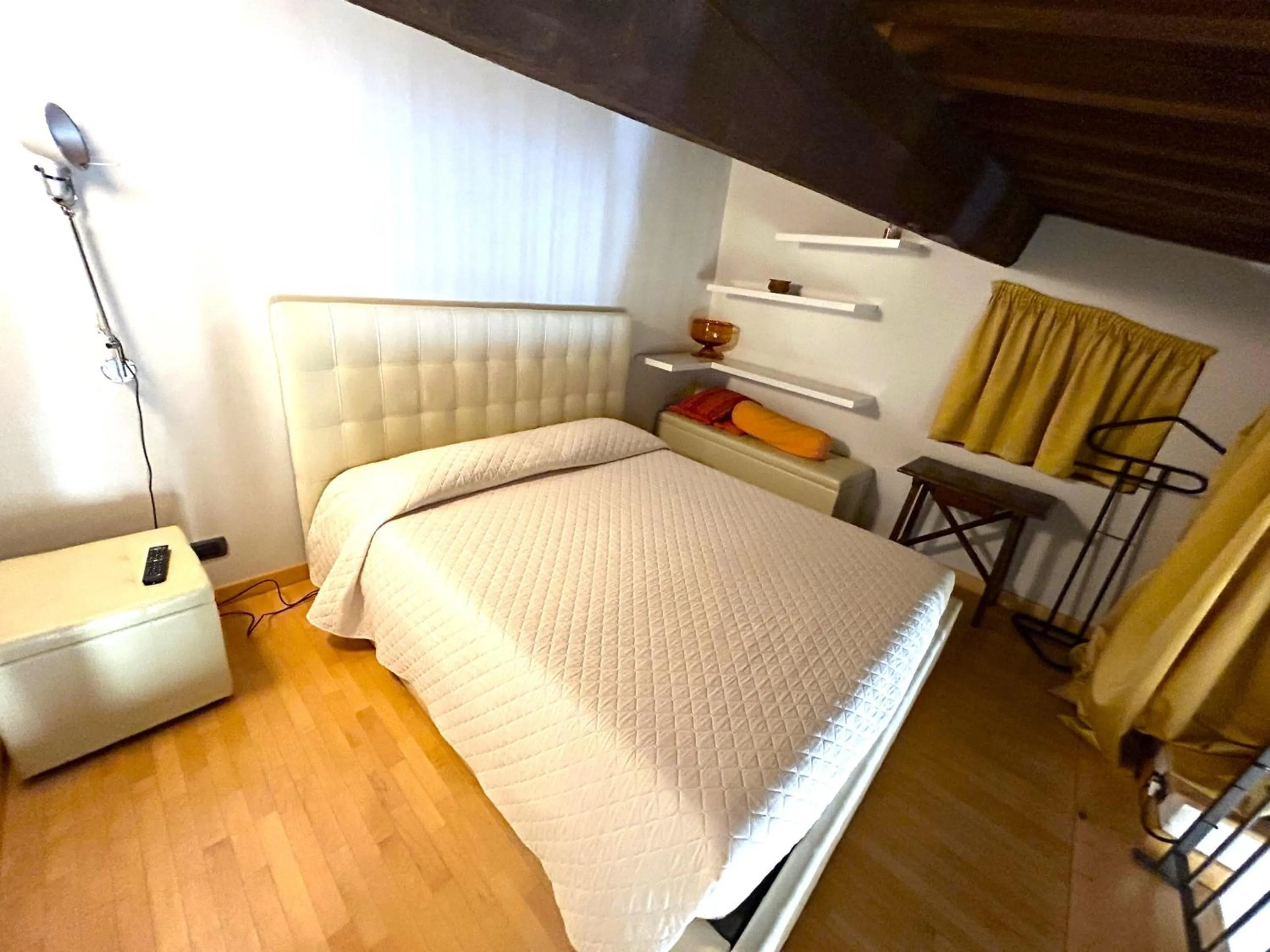 Bed in La Corte Del Re Suite & Rooms Arezzo