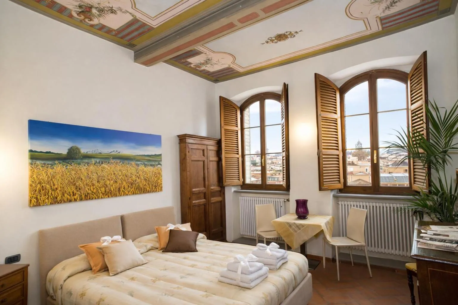 Bed in La Corte Del Re Suite & Rooms Arezzo