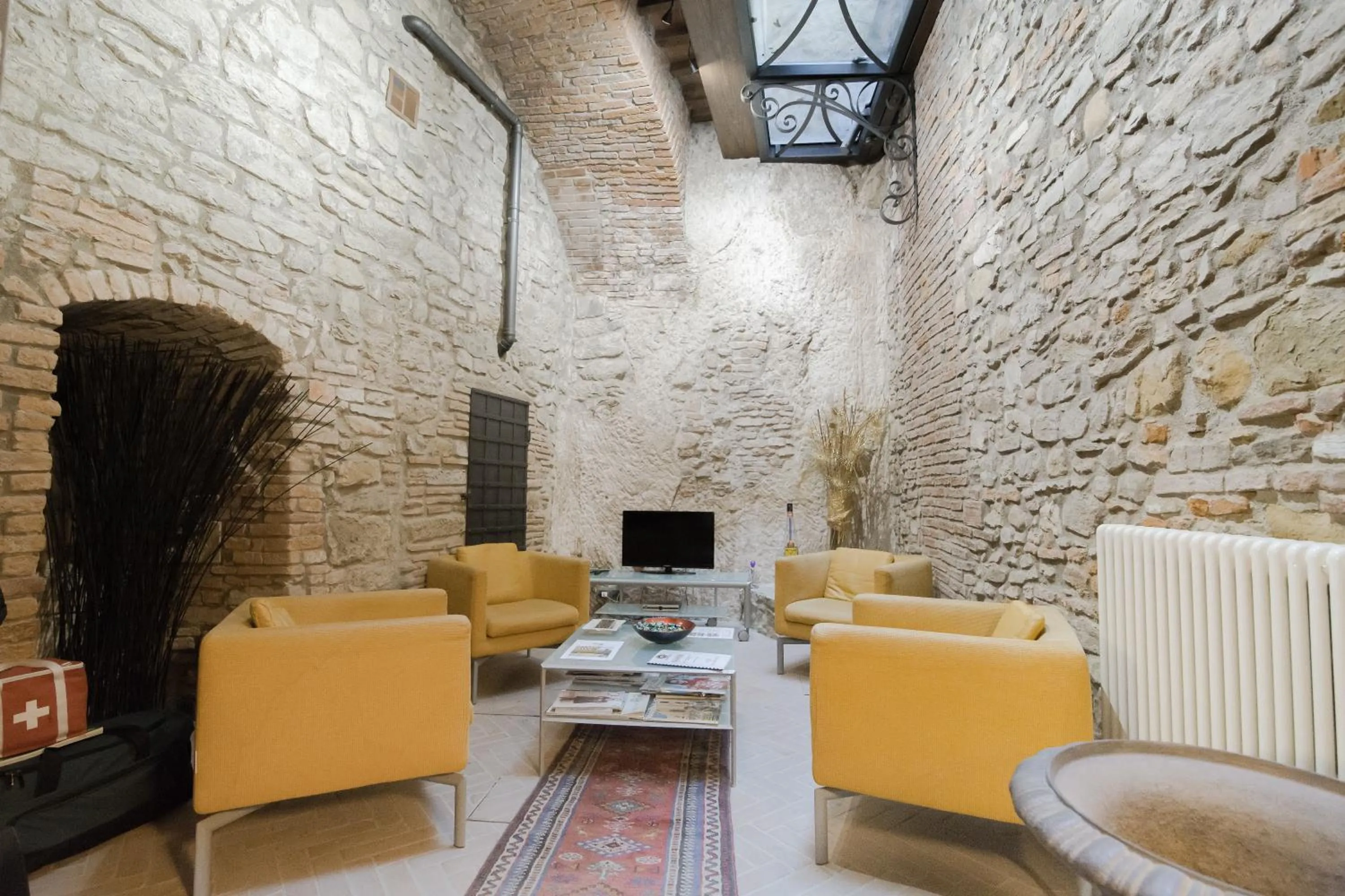 Lobby or reception in La Corte Del Re Suite & Rooms Arezzo