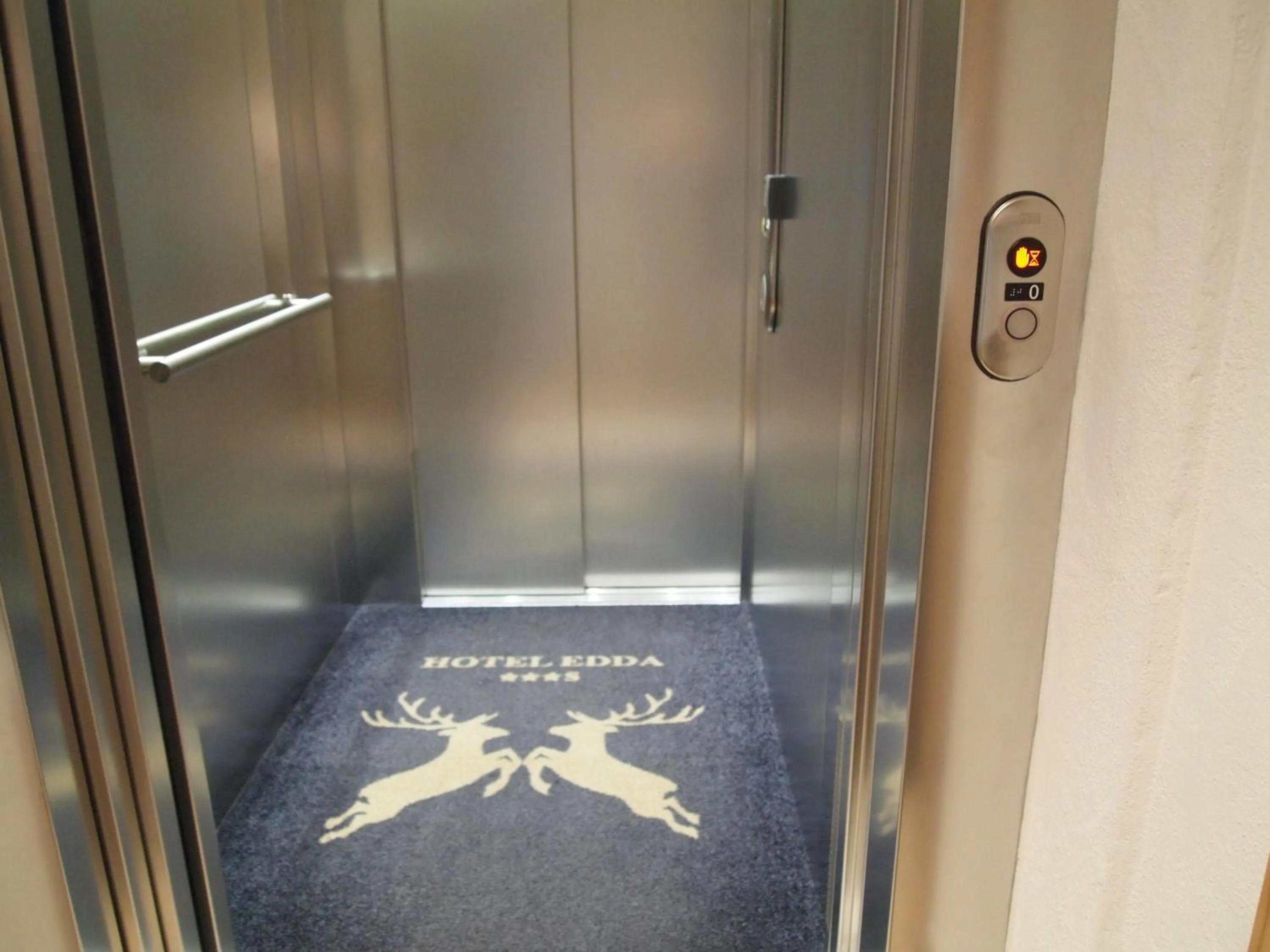 Property logo or sign in Hotel Edda