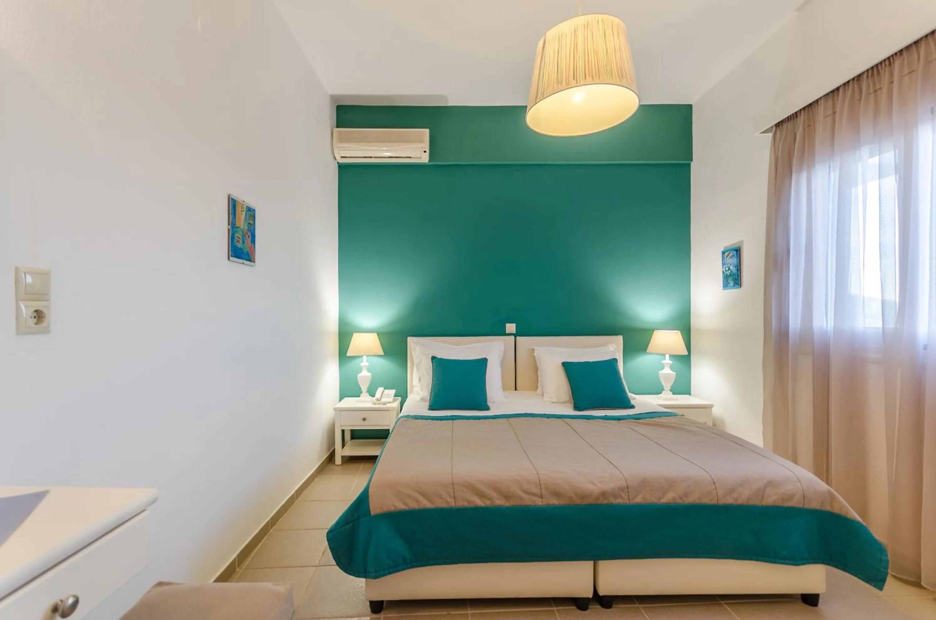 Bed in Pela Mare Hotel