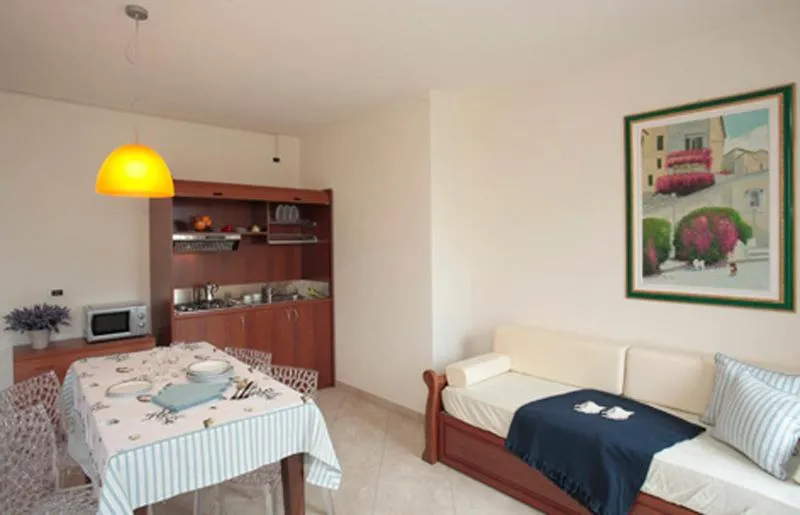 Living room, Bed in Residence Dell'Angelo