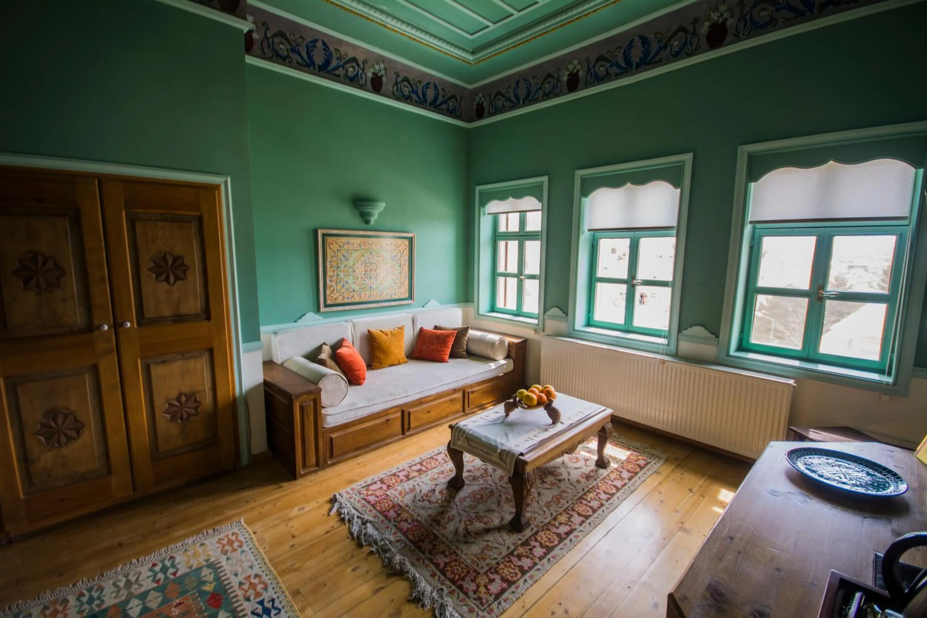 Seating area, Bed in Fresco Cave Suites Cappadocia
