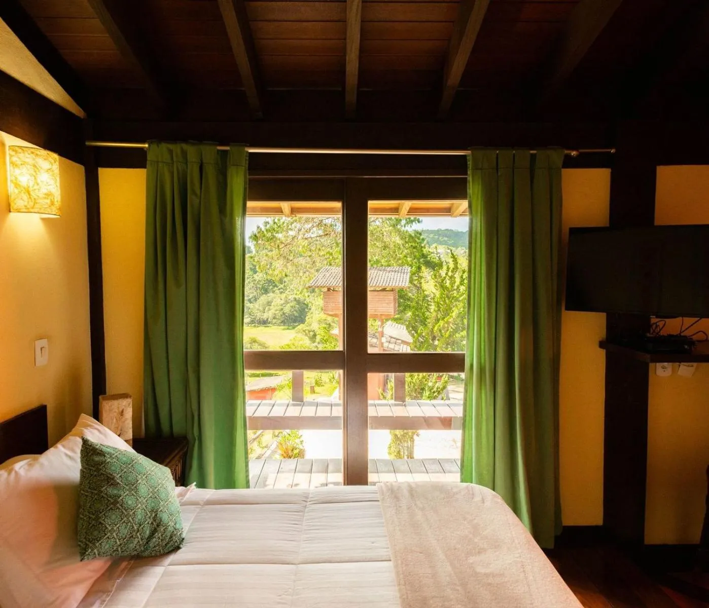 Bed in Pousada Jardim das Montanhas