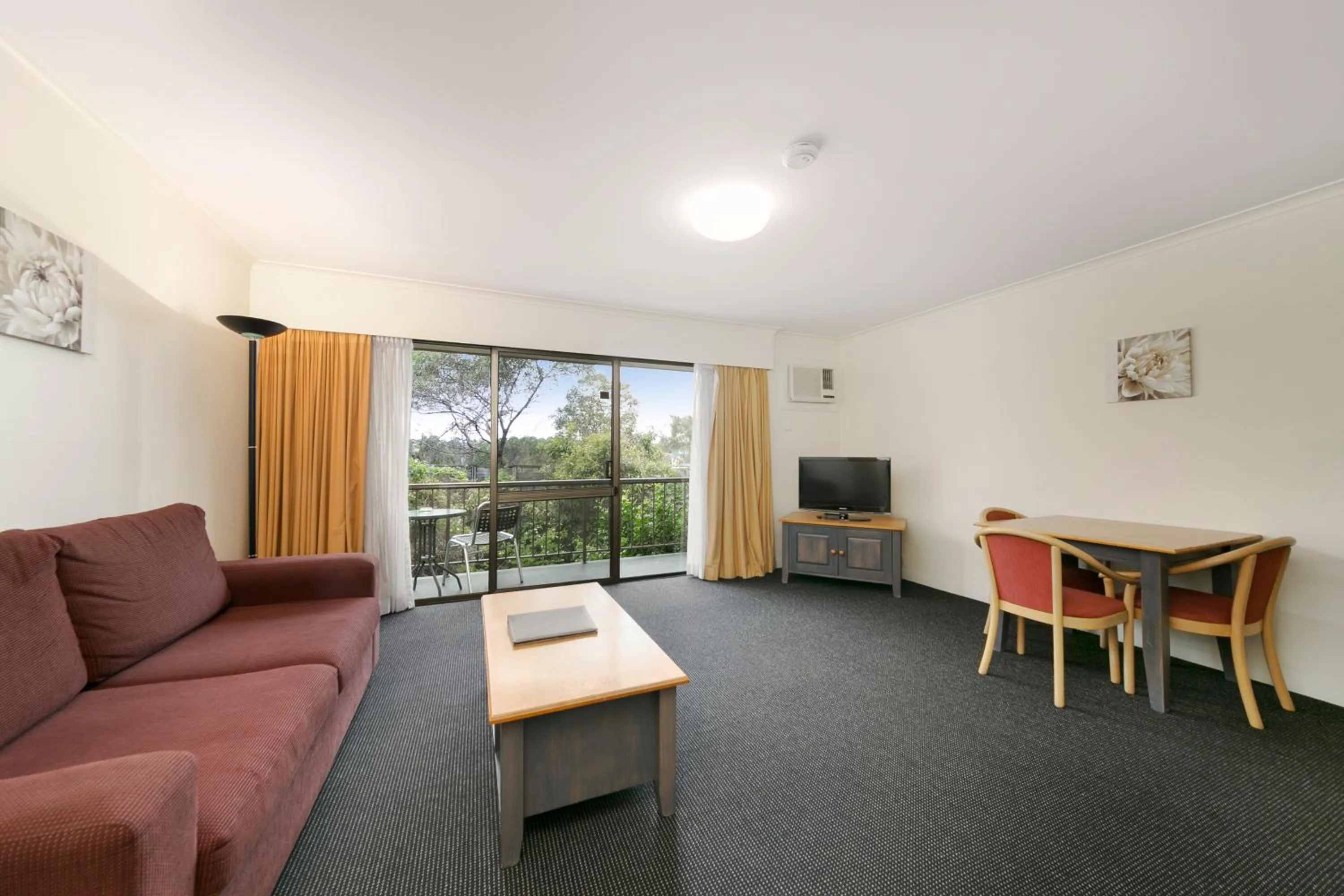 Living room in Mt Ommaney Hotel Apartments