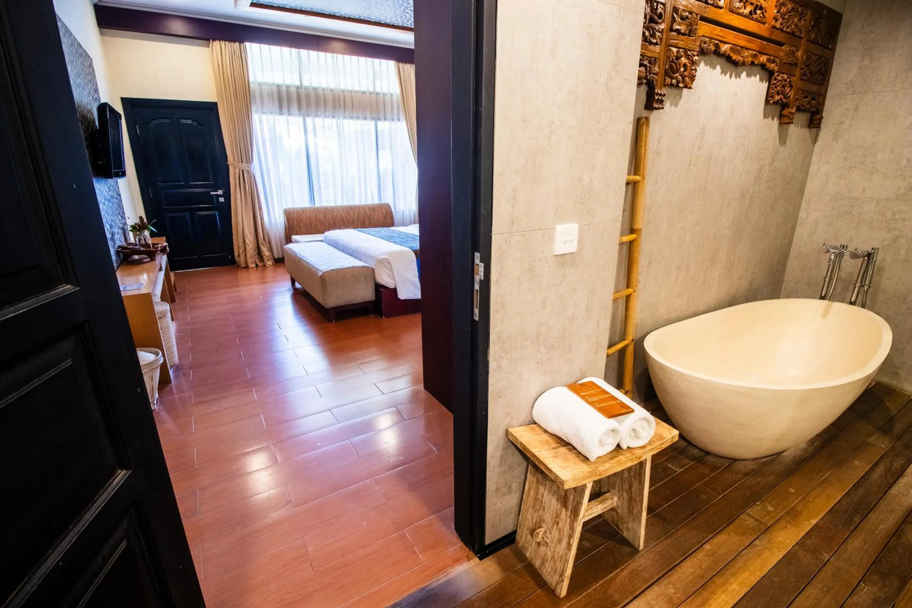 Bathroom, Bed in Natya Hotel Tanah Lot
