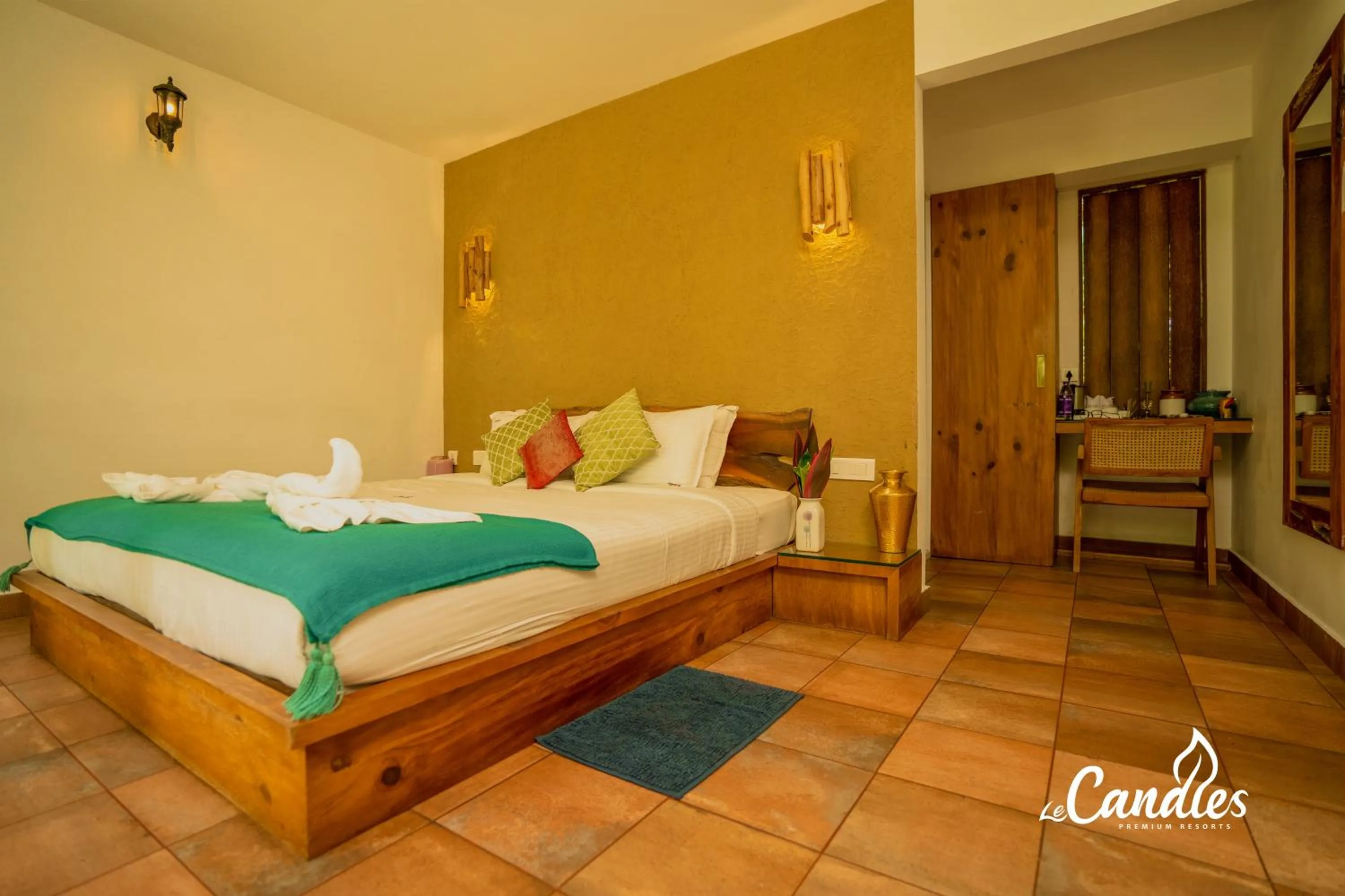 Patio, Bed in Le Candles Resort