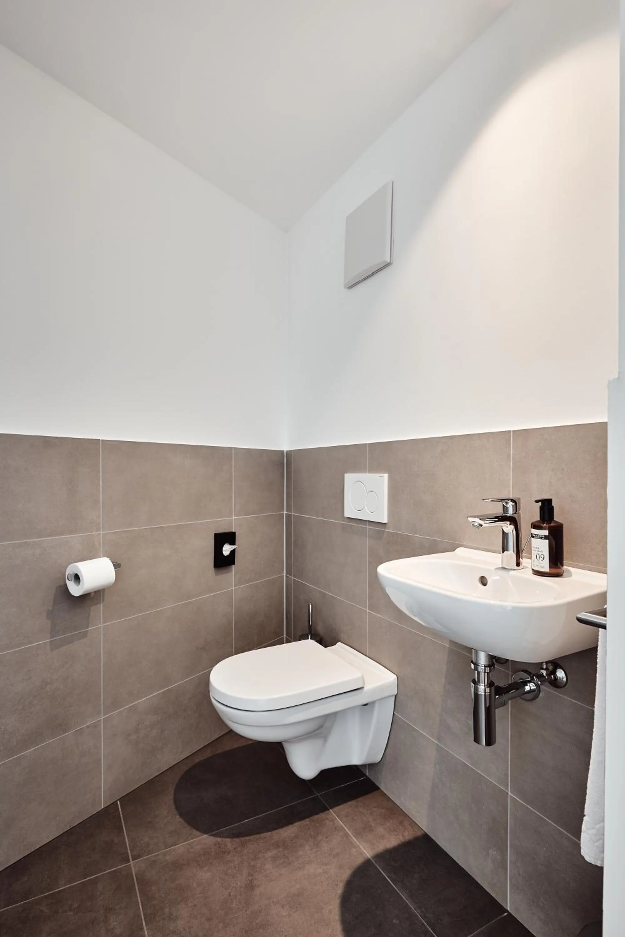 Toilet in Haller Suites & Restaurant