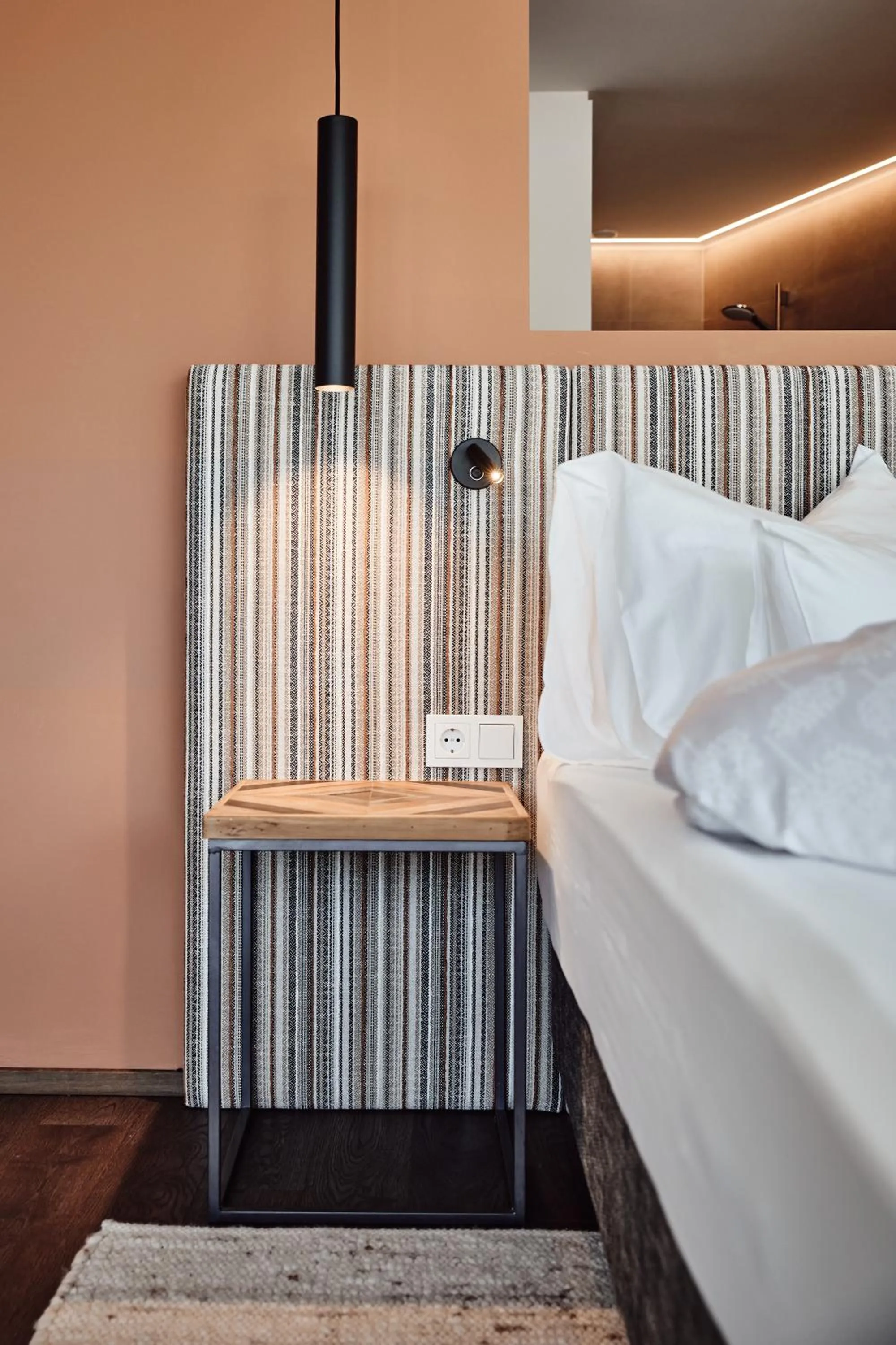 Bed in Haller Suites & Restaurant