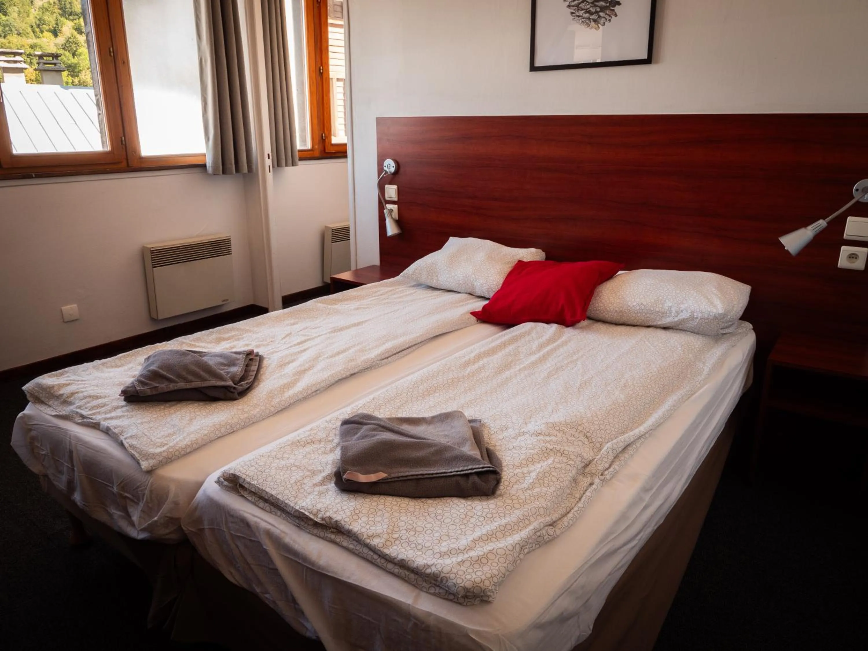 Bed in Hotel Chalet du Crey
