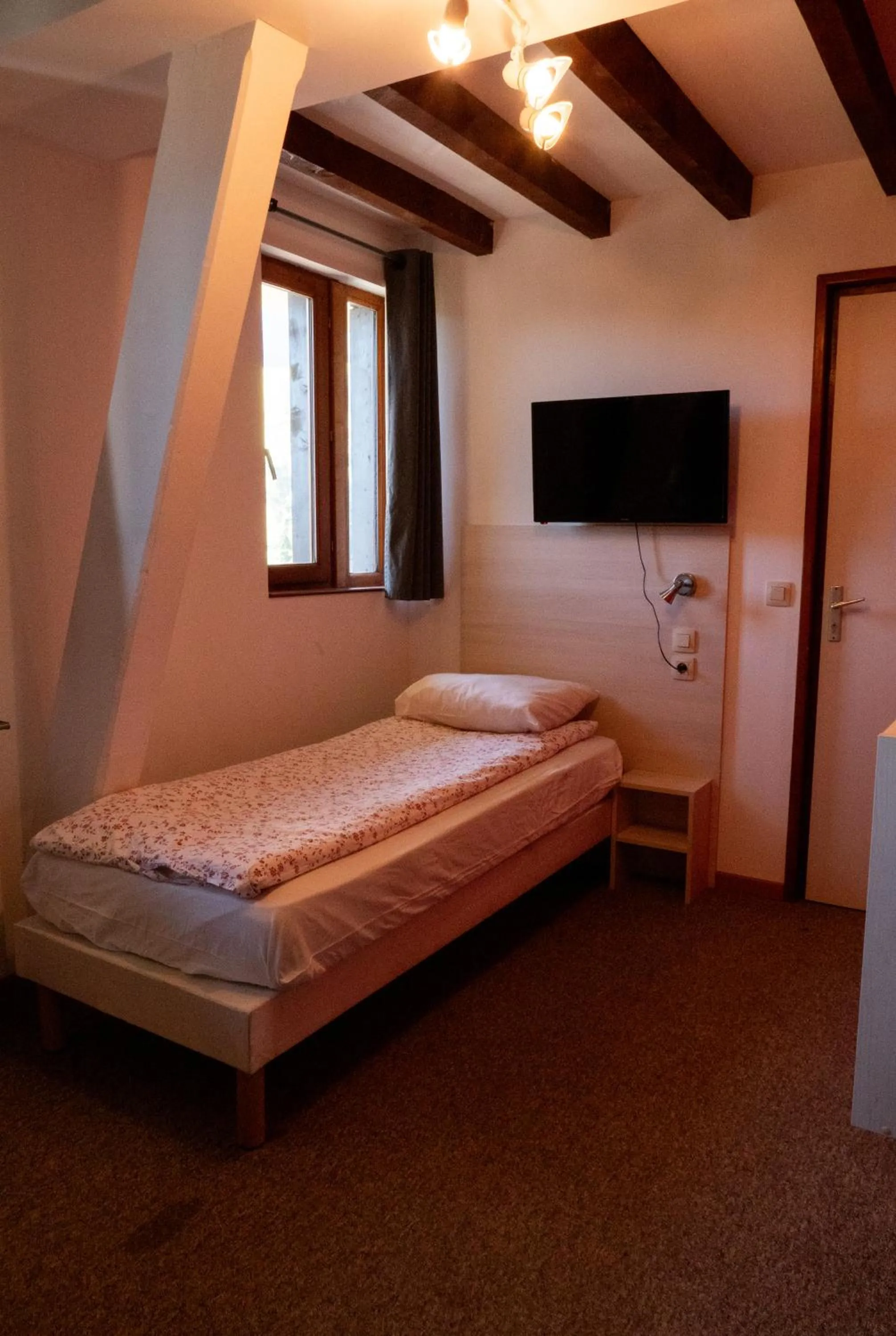 Bed in Hotel Chalet du Crey