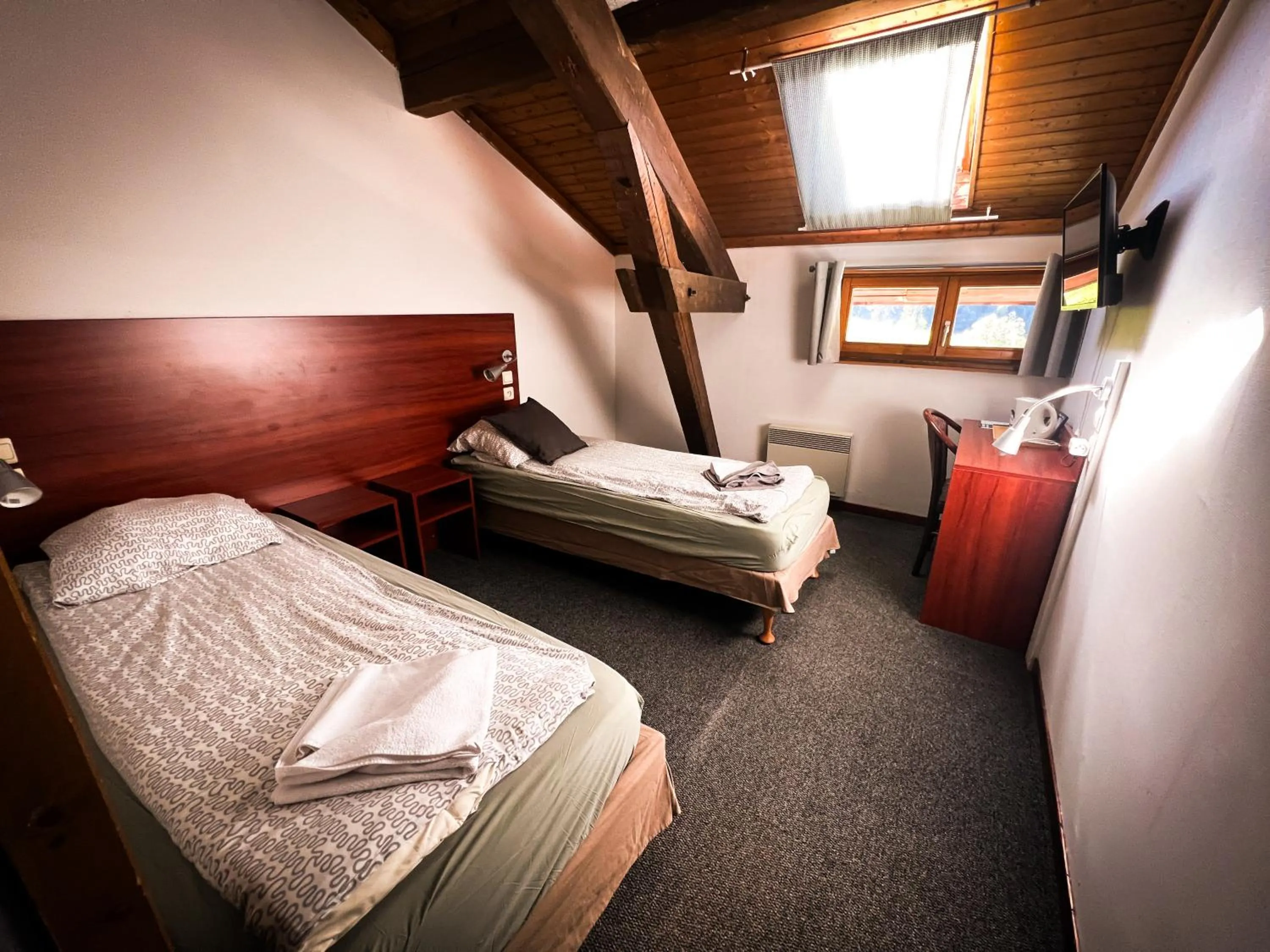 Bed in Hotel Chalet du Crey