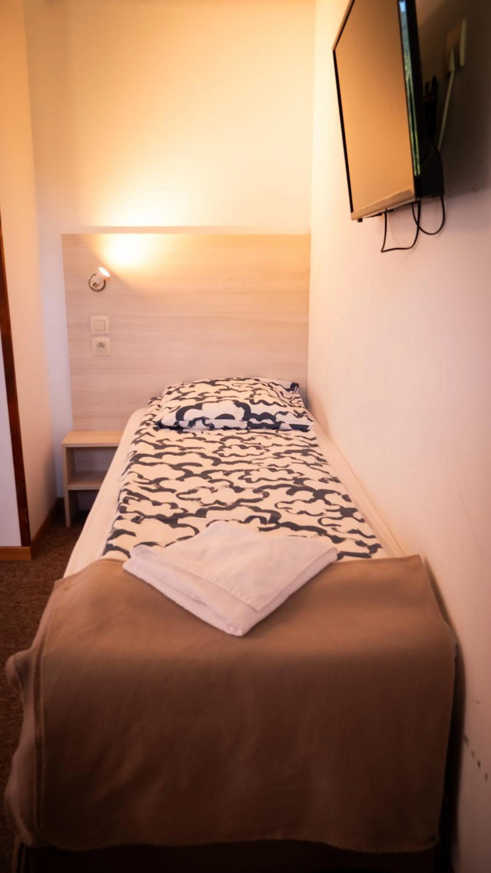 Bed in Hotel Chalet du Crey