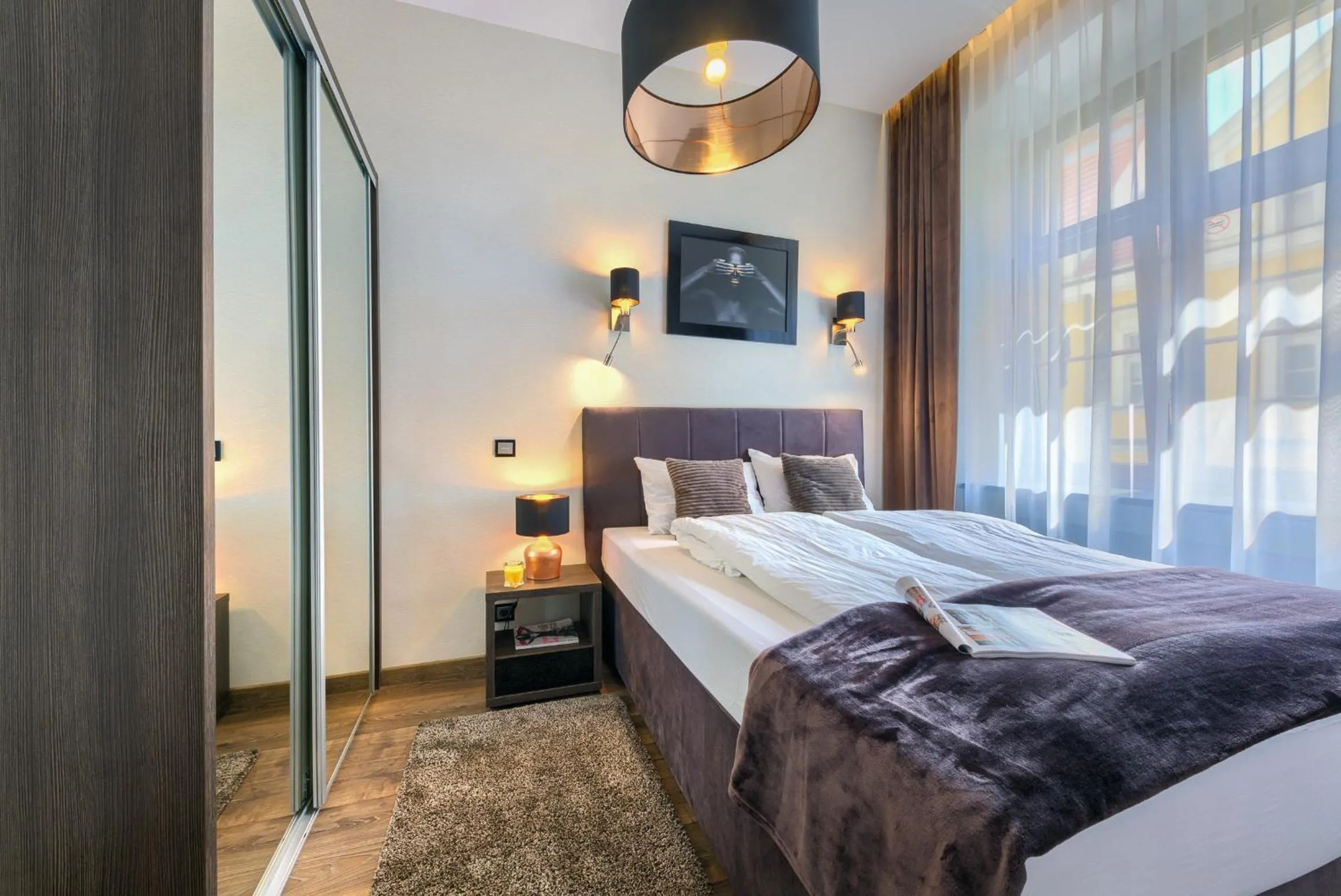 Bed in Aparthotel New Lux