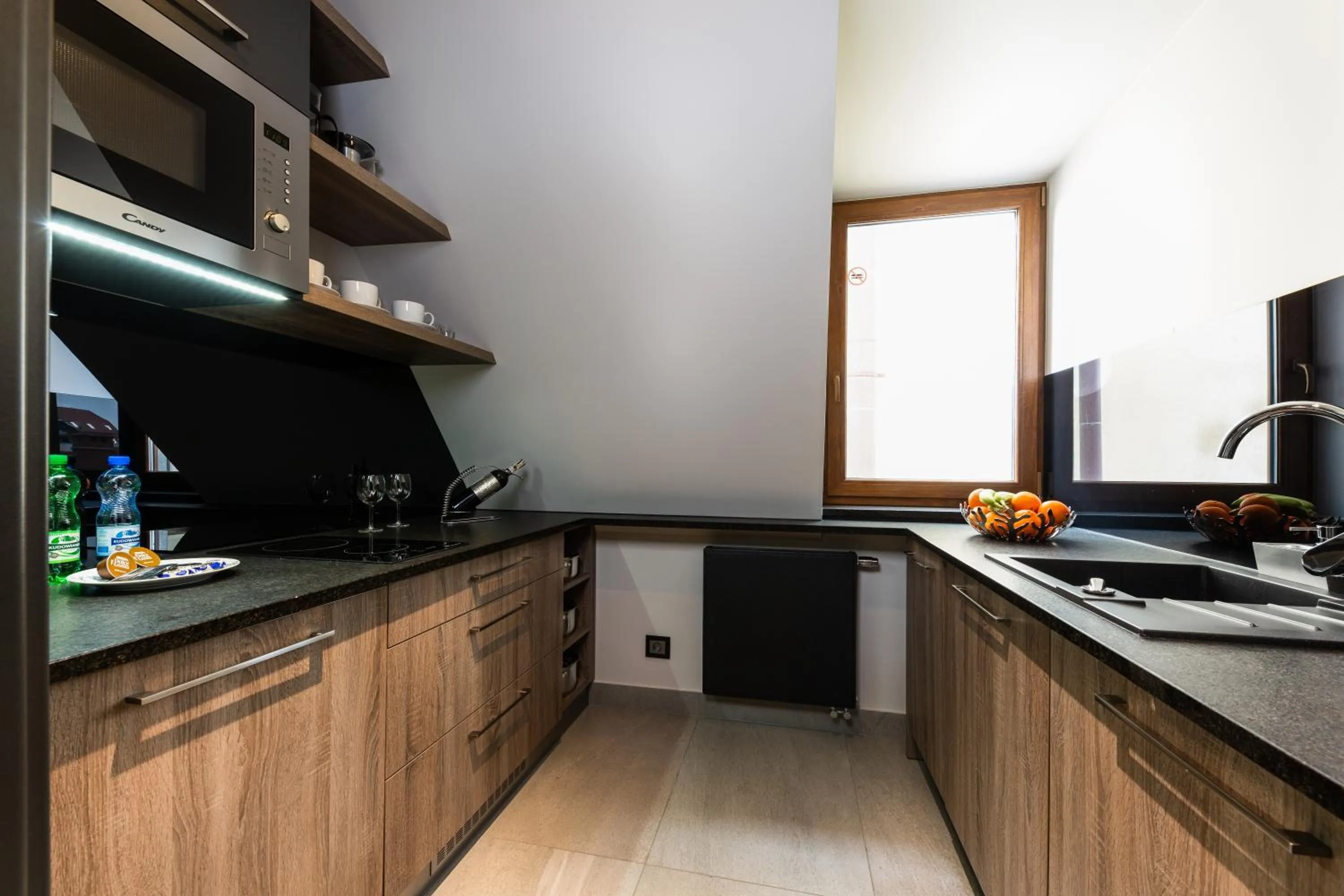 Kitchen or kitchenette in Aparthotel New Lux