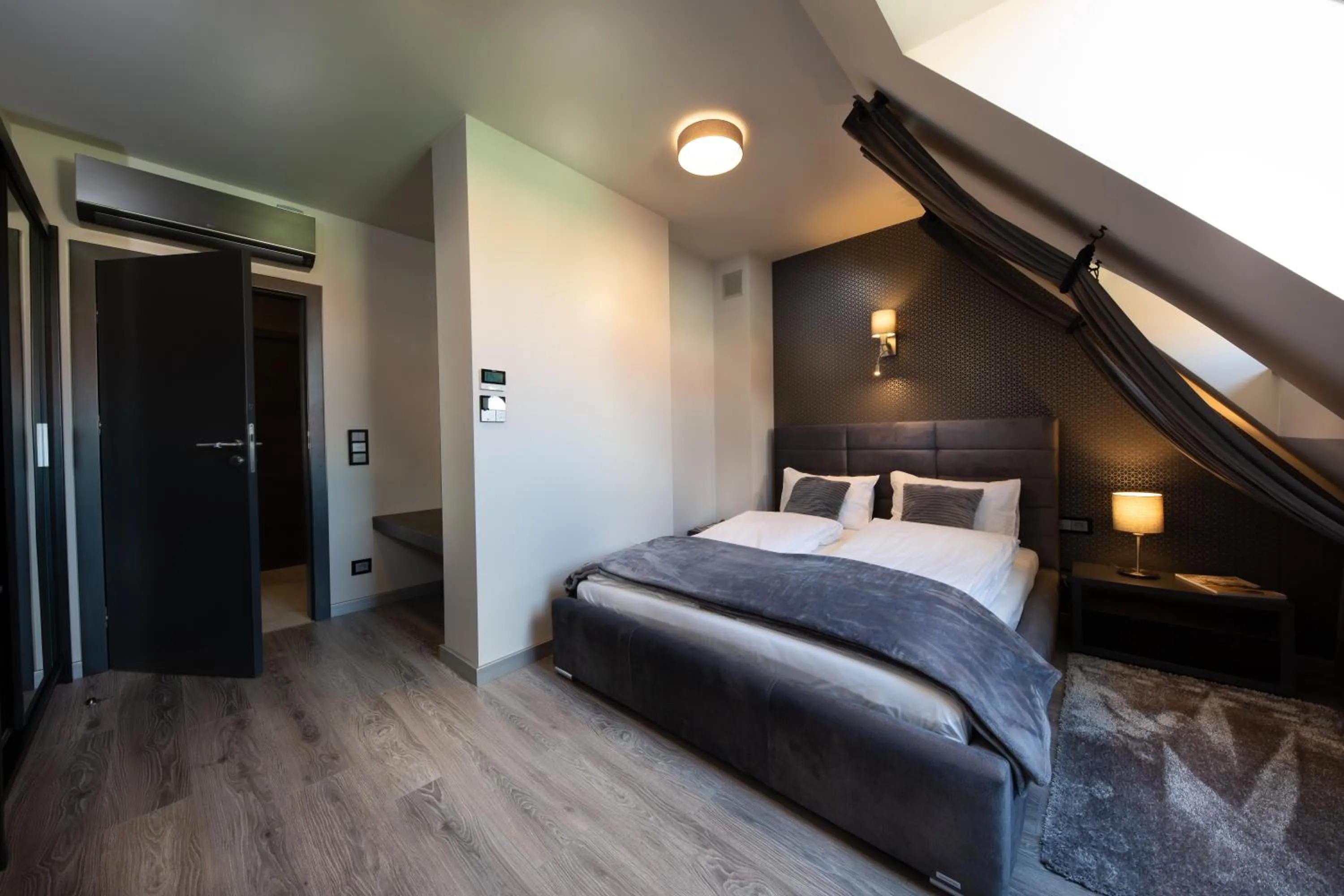 Bed in Aparthotel New Lux