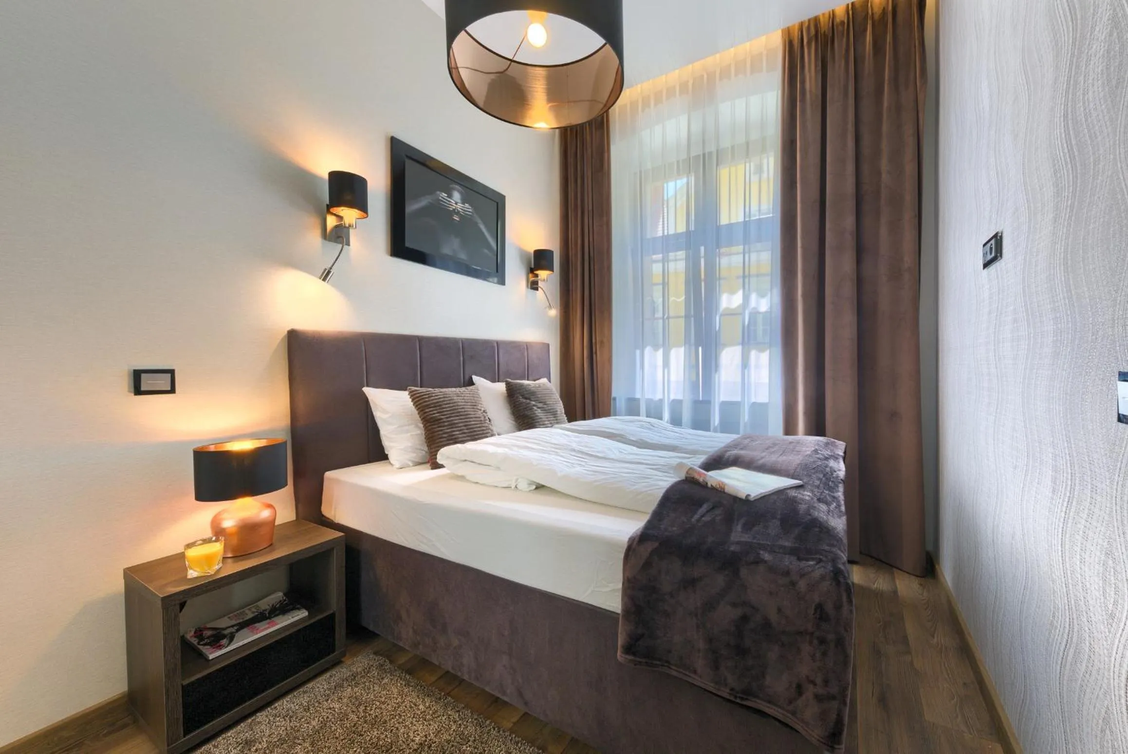 Bed in Aparthotel New Lux