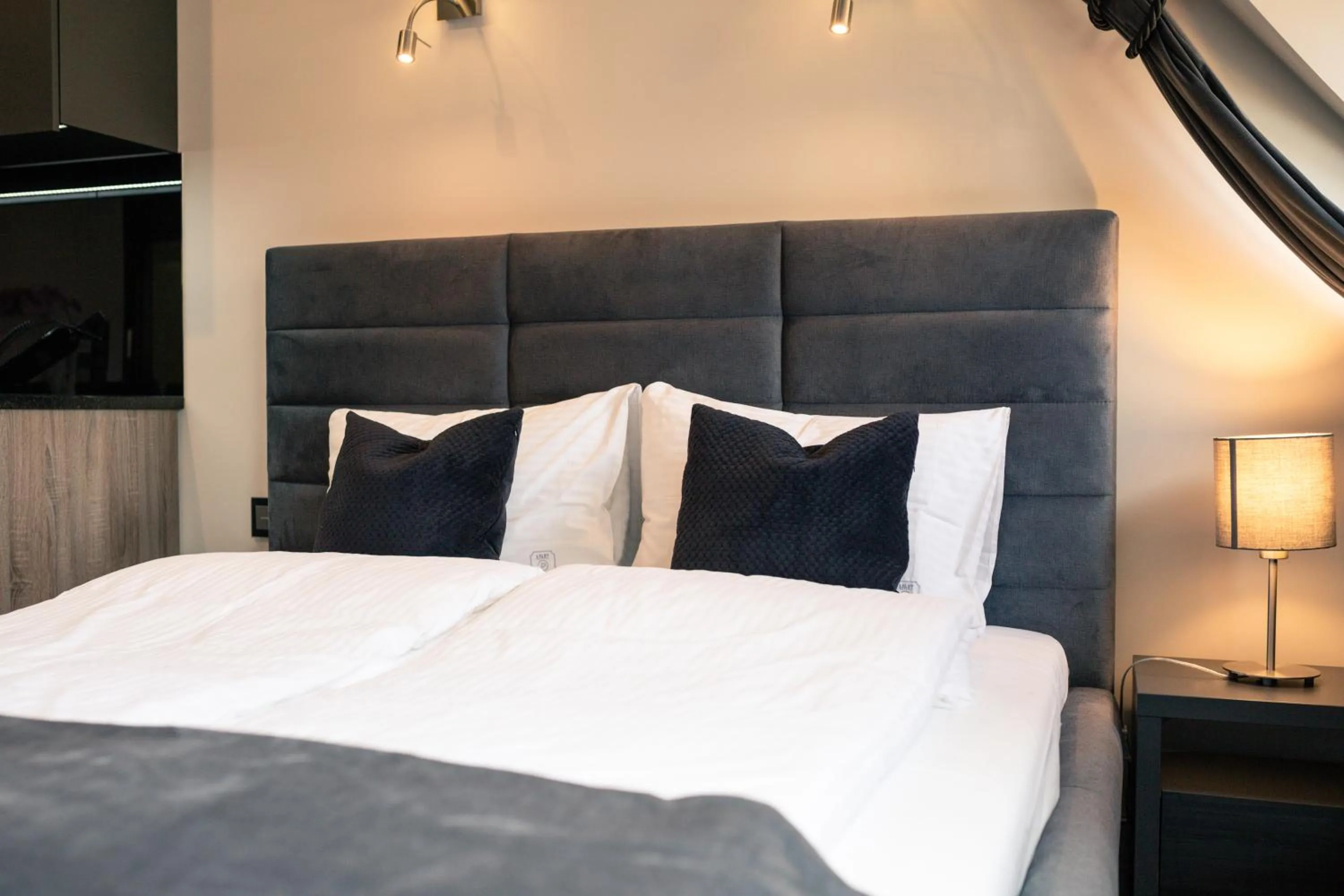 Bed in Aparthotel New Lux