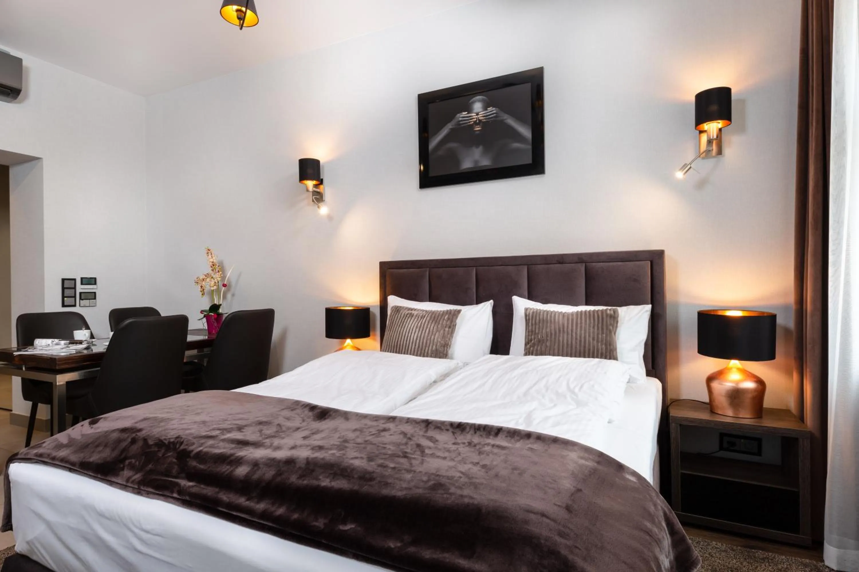 Bed in Aparthotel New Lux