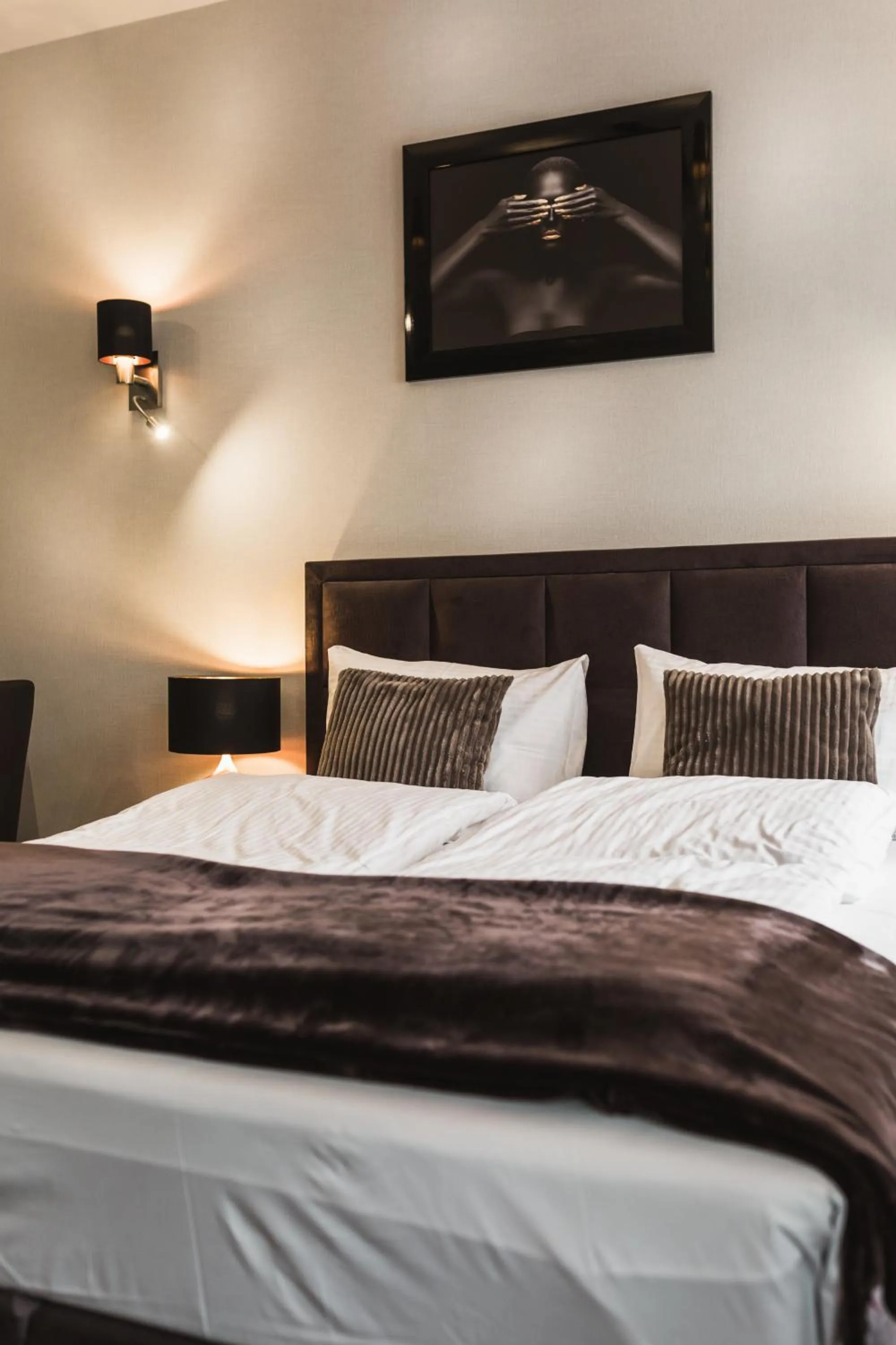 Bed in Aparthotel New Lux