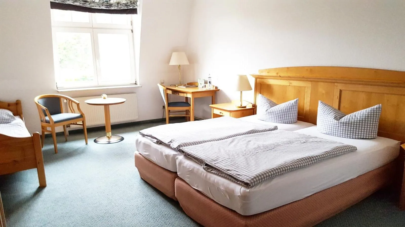 Photo of the whole room, Bed in Meeressterne Hotel Idyll Am Wolgastsee