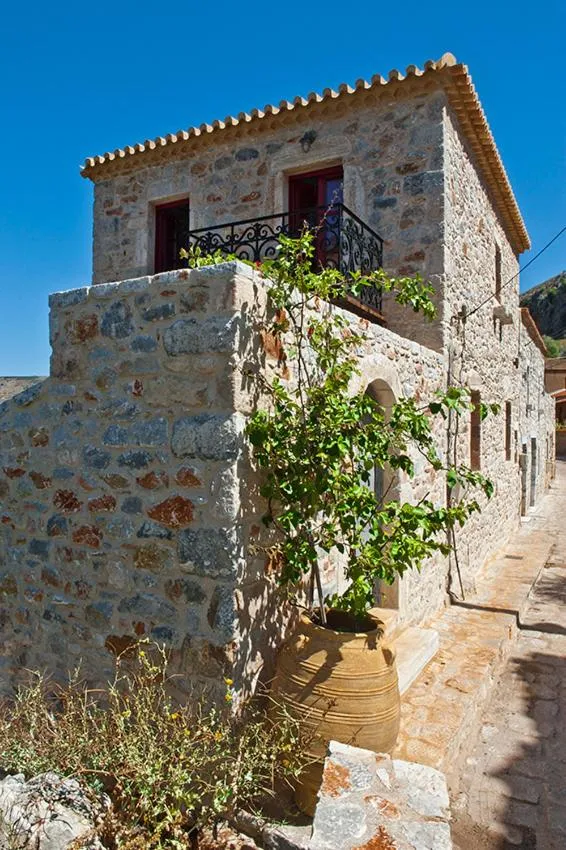 Property building in Limeni Villa