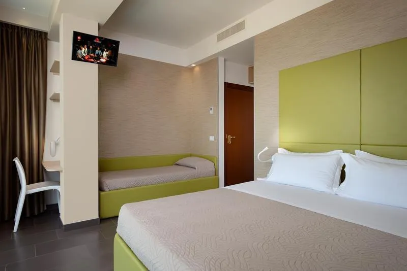 Bed in Hotel Excelsior