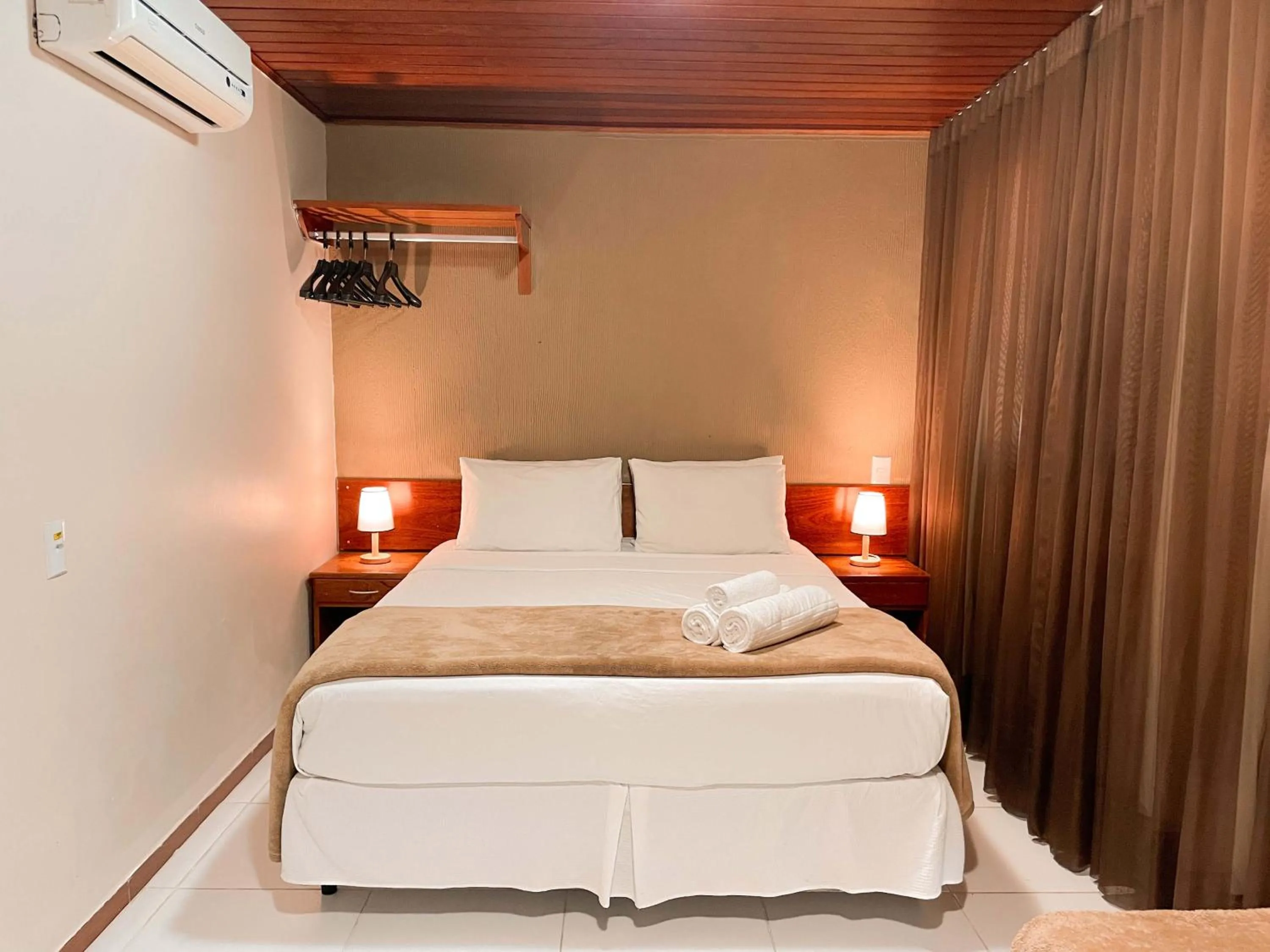 Bed in Hotel Fazenda China Park