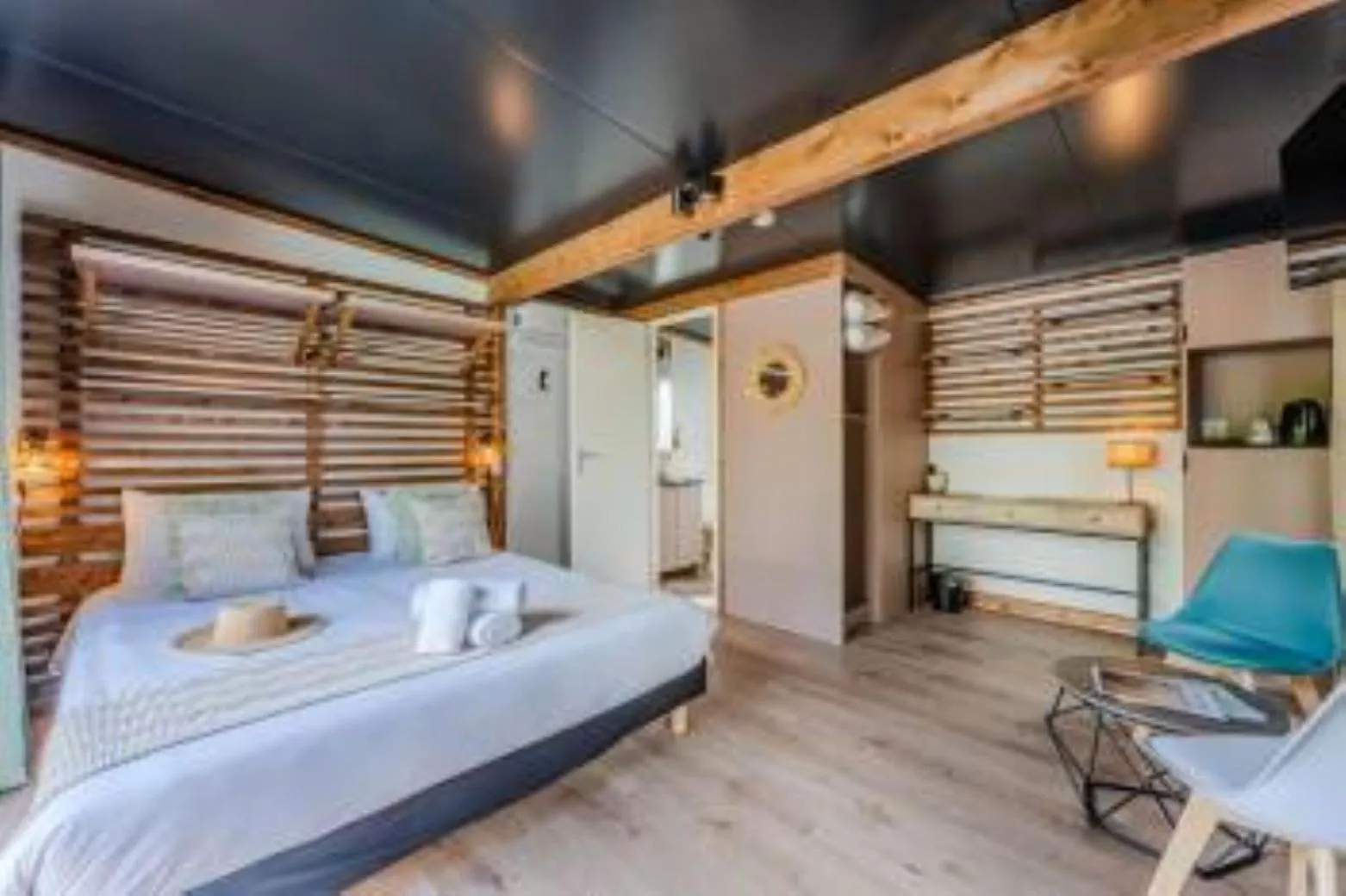 Photo of the whole room, Bed in Hôtel Le Grain de Sable