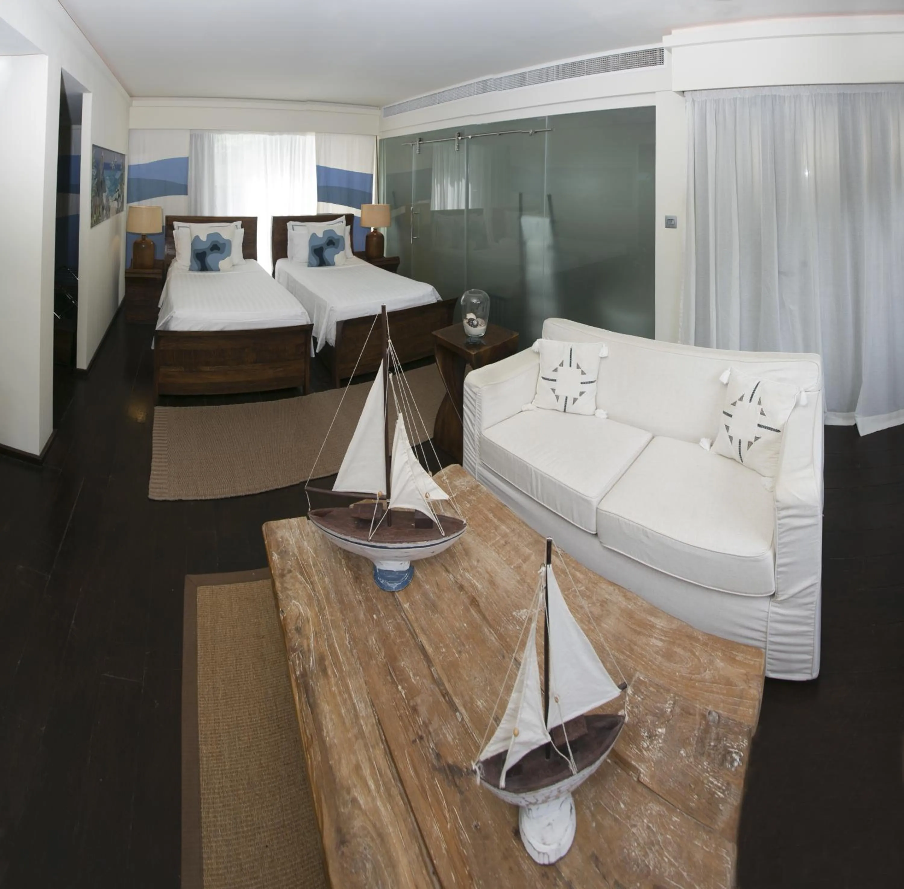 Photo of the whole room, Bed in Dhevatara Beach Hotel