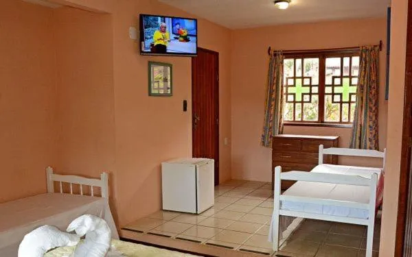 Bed in Pousada 4 Ventos