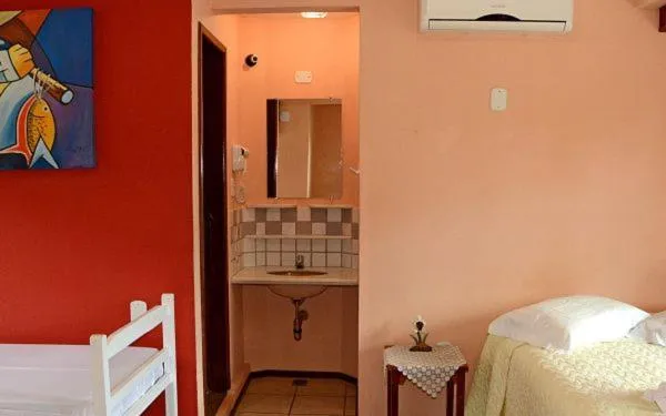 Bed in Pousada 4 Ventos